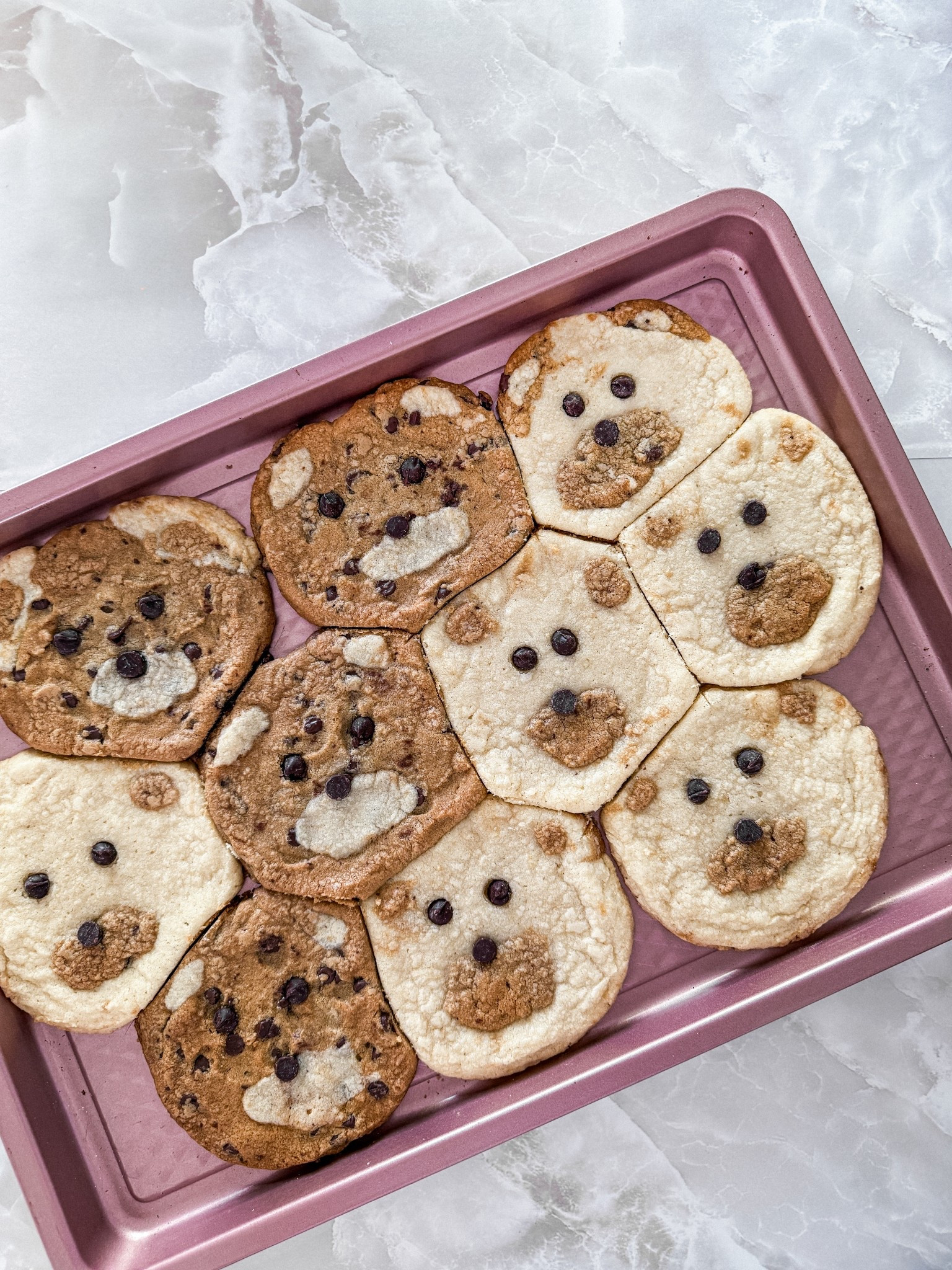 how cute are these teddy bear cookies I made the other day 🥹 it was my first time, but they turned out so good! next time I need to use less dough for each, and a bigger sheet so they have room to expand without connecting to each other; but overall I still love how they turned out! and my kids were so happy to try them 🐻🍪 

ingredients:
sugar cookie dough
choc chip cookie dough
chocolate chips
#baking #bakingrecipe #kidstreats #kidssnacks #recipe #cookies 

#LTKHome #LTKKids #LTKFamily