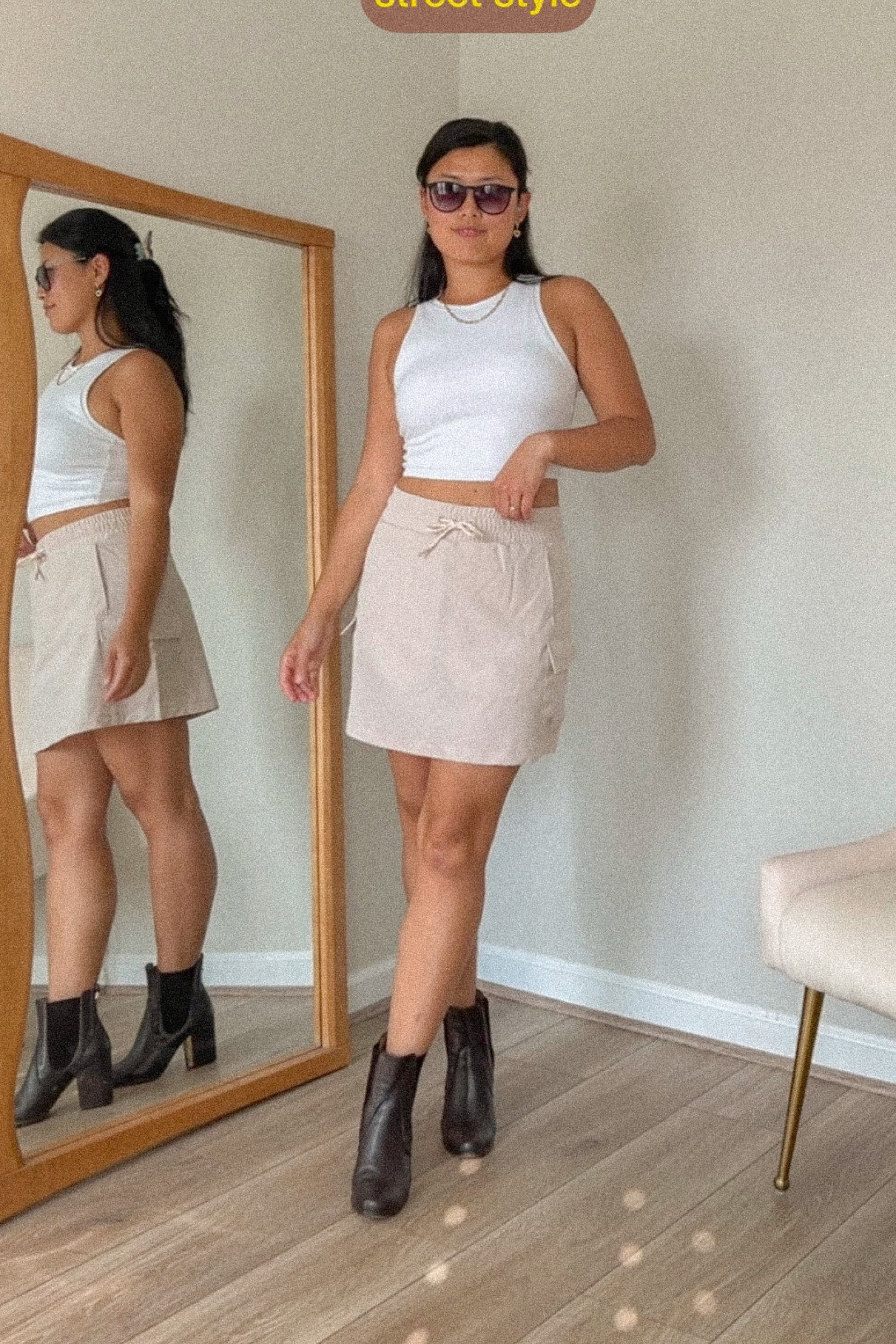 White racer top , cargo skirt, skort, boots heels, summer outfit, summer style

#LTKFind #LTKSeasonal #LTKstyletip
