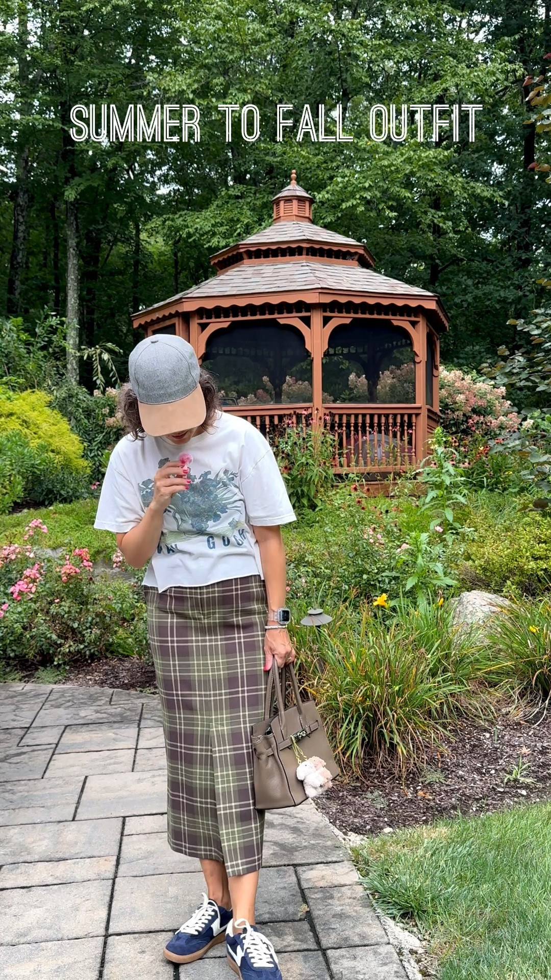 Summer to fall transition outfit today. Graphic T from TJMaxx, plaid midi skirt from Favorite Daughter, hat from Nordstrom, sneakers are on Dolce Vita and bag is from Epcot 😂

#LTKootd #LTKSeasonal #LTKOver40