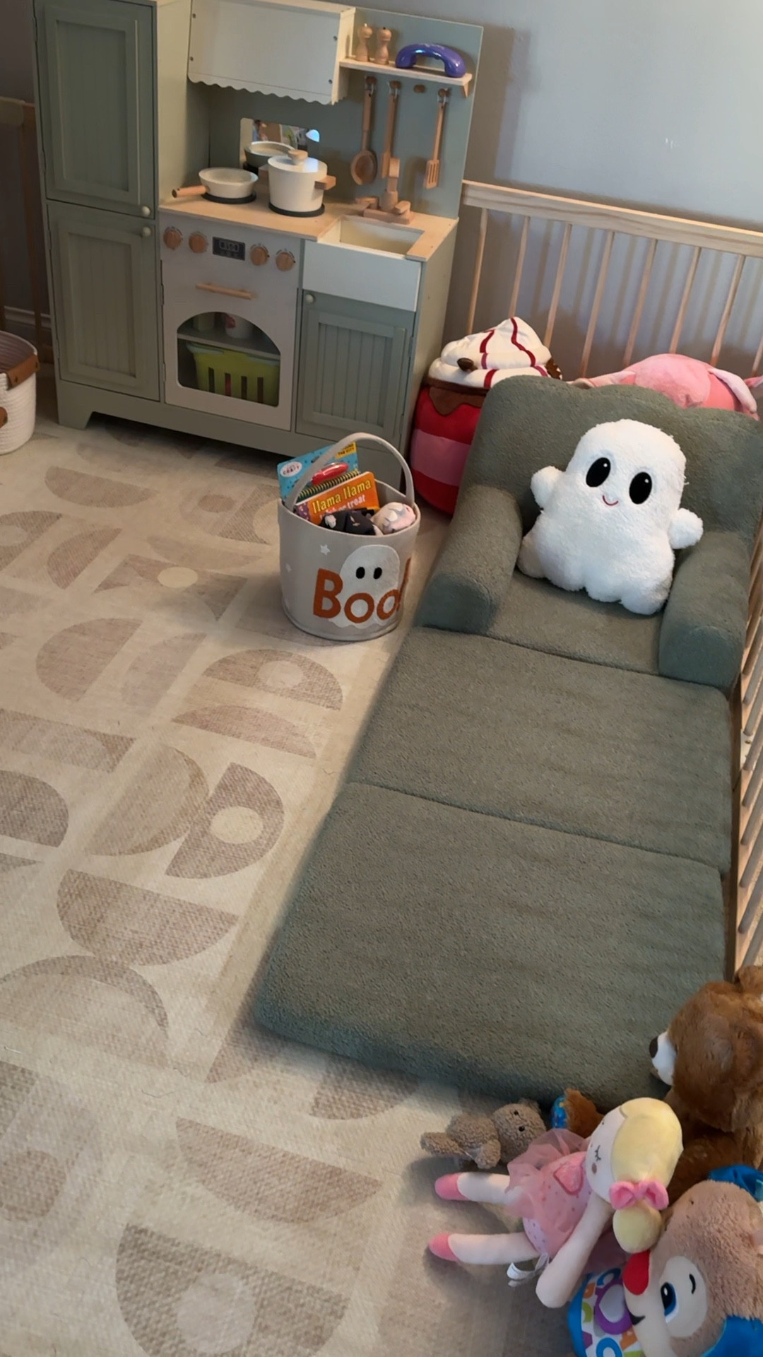 my daughter’s playpen set up 🫶🏼 | I love it! we set it up when she was 9 months old and it has been awesome ever since! | house of noa play mat | toddler couch | play kitchen | Montessori book shelf | toddler bookshelf | scallop edge bookshelf | toddler playroom | toddler play area 

#LTKBaby #LTKKids #LTKHome