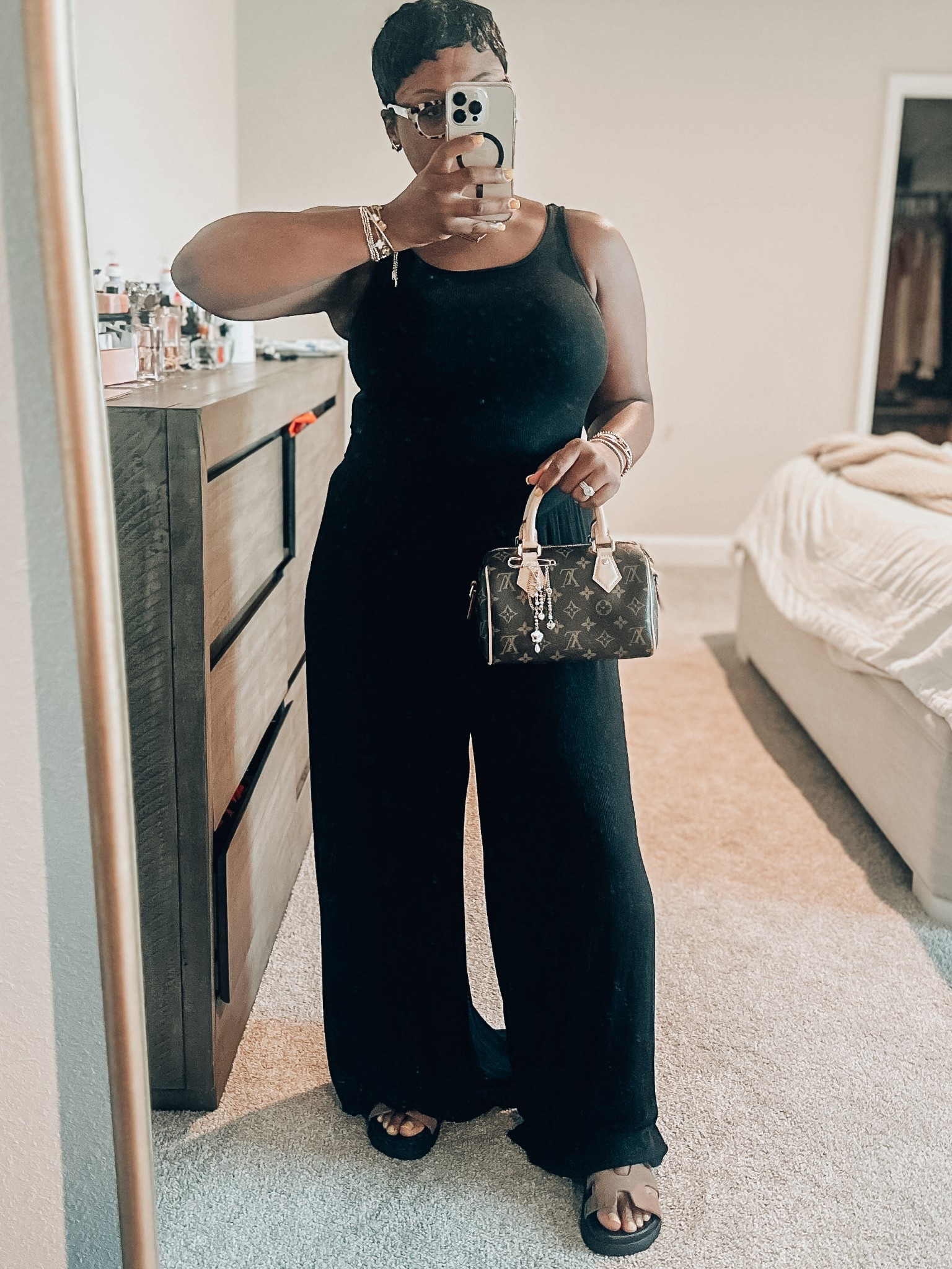 Effortless, elevated, and easy. 🖤
Today’s fit:
• Wide-leg black jumpsuitt
• Flat sandals
• LV Speedy
• Gold accessories

A go-to summer modest look that keeps you comfy and cute. #ModestStyle #MinimalCHiC #LTKStyle #ModestOutfit

#LTKPetite #LTKStyleTip #LTKMidsize