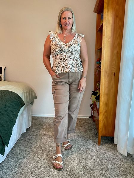 Utility pants or cargo pants? Whatever you call 'em, I love 'em!

Mixing affordable styles as usual. Top is Old Navy. Tts. I'm in large.
Pants and sandals are Target. Normal 12 was a little snug in the pants and the 14 could stand to shrink in the dryer a tad (or see a tailor - tbh). Sandals are old but could maybe be found on clearance. Tts. I'm in a 9.

#LTKSeasonal #LTKworkwear #LTKunder50