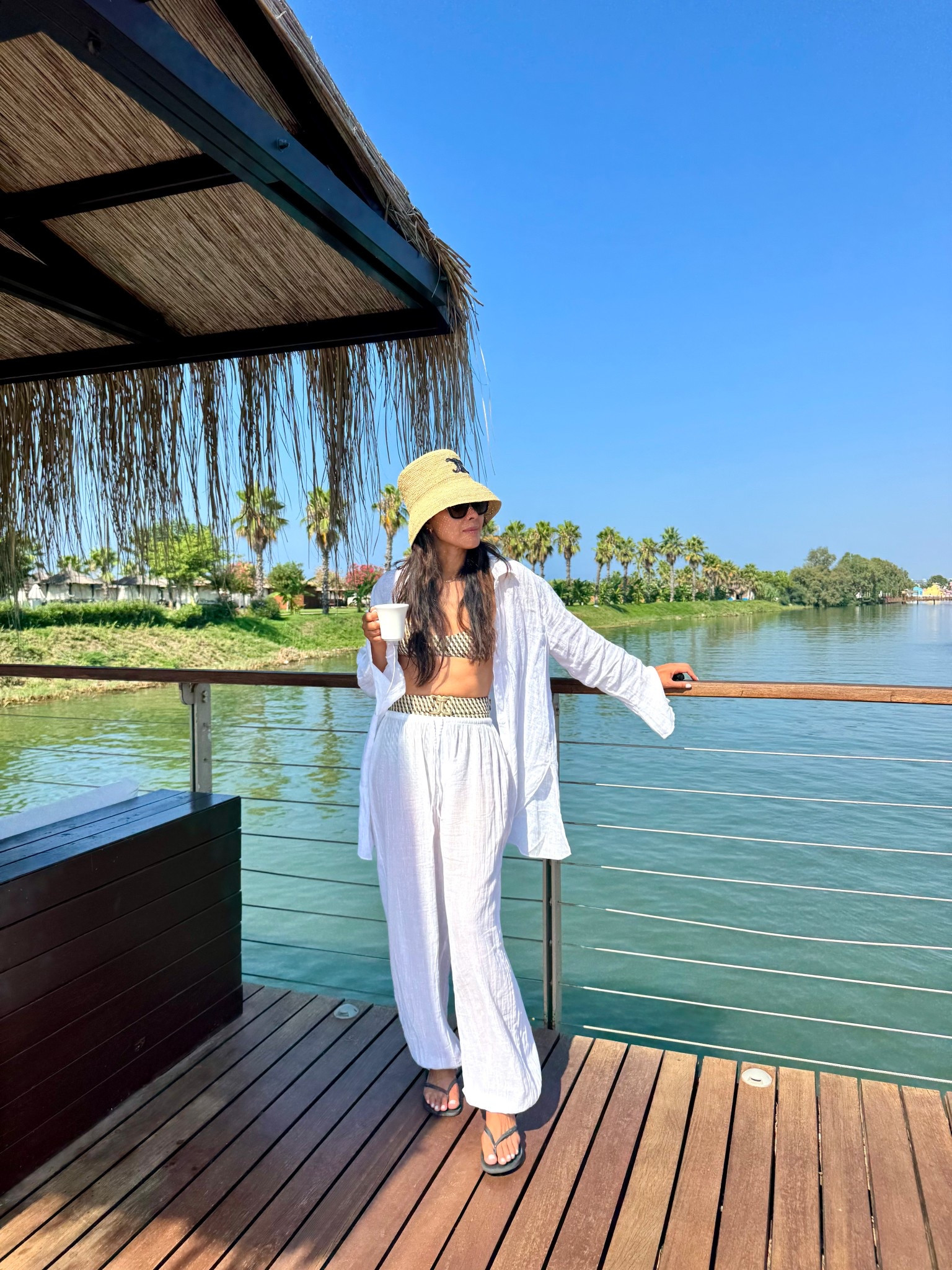 Super soft linen shirt and soft cotton trousers for a day at the beach. Perfect coverup attire. Bikini is Zimmerman from The Outnet and high waisted. Hat is Celine and sandals are Havianas. 

#LTKtravel #LTKeurope #LTKsummer