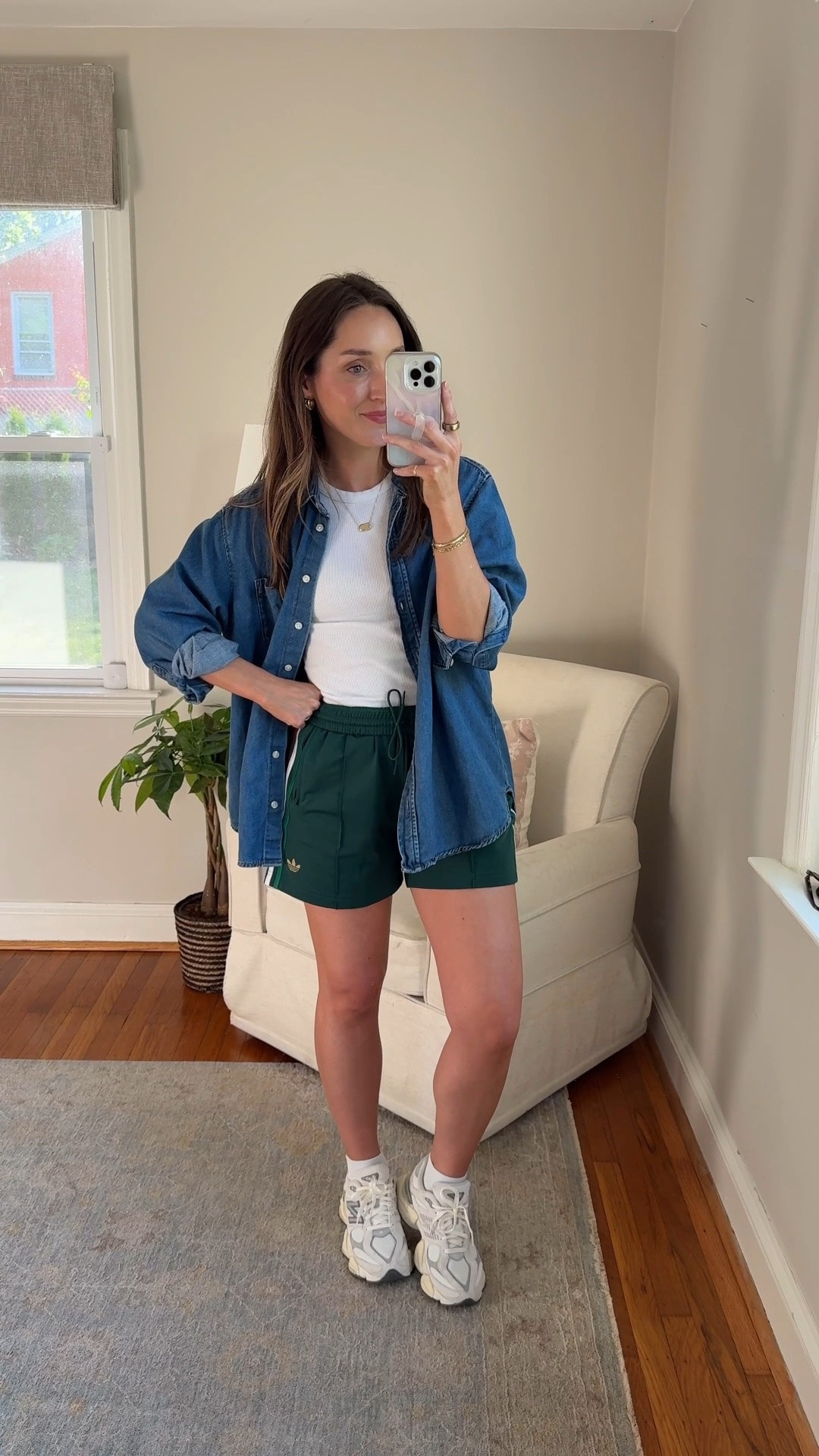Wearing XS tank, small shorts (run a little small), medium denim shirt. Shoes are tts.
