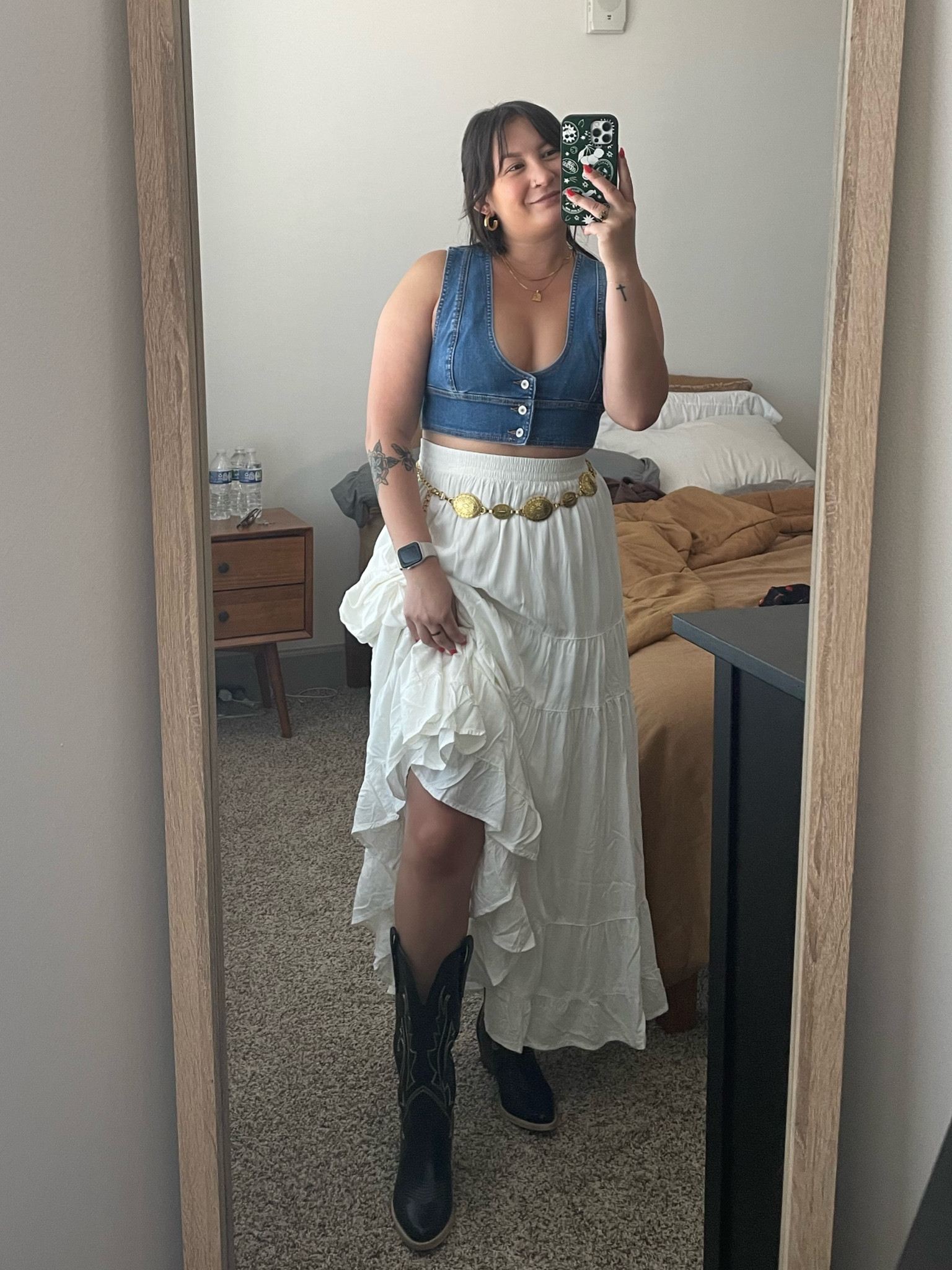 Country concert ready for Zach Bryan🎵🌞  
The skirt is sold out online from American Eagle, but I linked something similar from Amazon!
Wearing a size medium top, small in the skirt, size 6 in the boots!

#LTKFindsUnder100 #LTKFindsUnder50