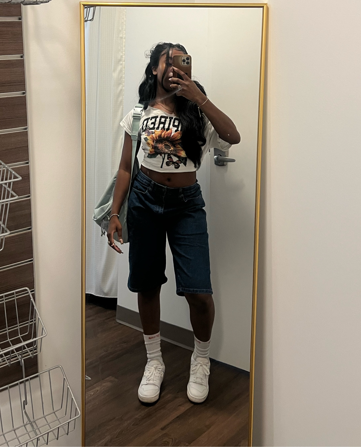 I have ‘silver birch’ new balance 550, also bought the shirt in store at walmart and cut it. the bag is an older version of the one linked 
