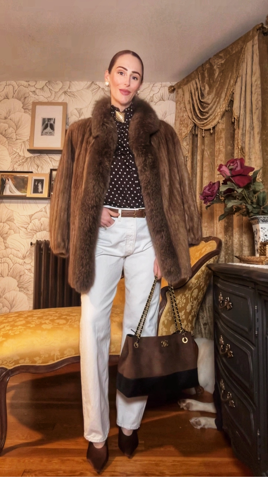 Real-time styling today using one of my favorite outfit formulas: pattern + texture + structured accessories.

Starting with crisp white trousers as the base, then adding a chocolate brown polka-dot blouse for a little visual interest while still staying in a neutral palette. Next I layered on a fur-collar vest to bring warmth and texture—this piece instantly makes the outfit feel more elevated.

To finish the look, I added a structured belt, gold statement earrings, and a two-tone brown handbag to tie the color story together. The sleek brown wedges keep the silhouette long and polished.

A great example of how mixing textures within the same color family can make a neutral outfit feel rich, layered, and intentional.

Linked similar polka-dot blouses, white trousers, chocolate brown accessories, and wedges so you can recreate the look.

#LTKStyle #LTKSeasonal #LTKSpring #LTKWorkwear #NeutralStyle #PolkaDotStyle #BrownOutfit #TransitionalStyle #ClassicStyle #ElevatedEveryday #StyleFormula
