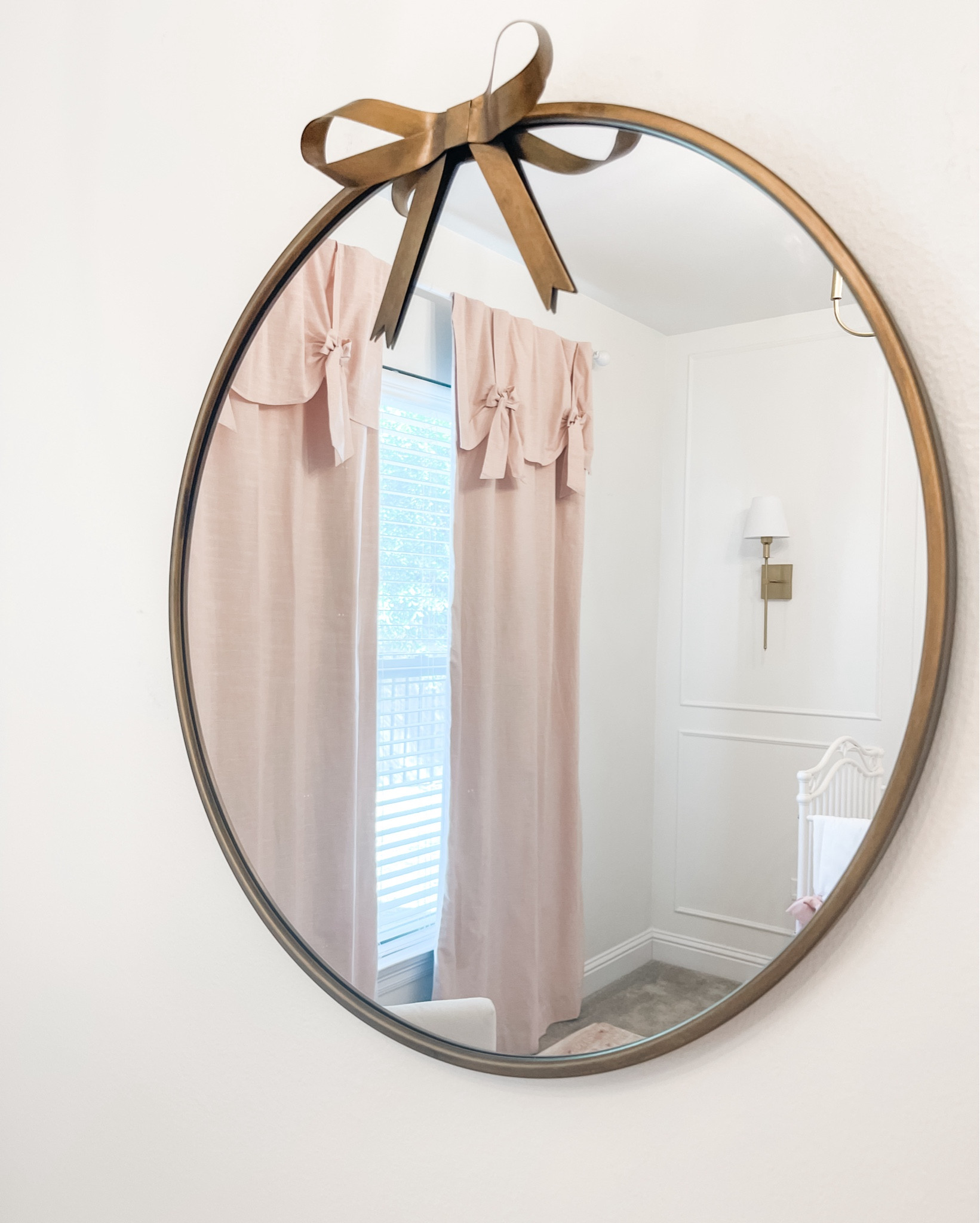 Baby girl nursery, pink and gold, bow nursery, sale, bow mirror, home finds 

#LTKBaby #LTKHome #LTKxNSale