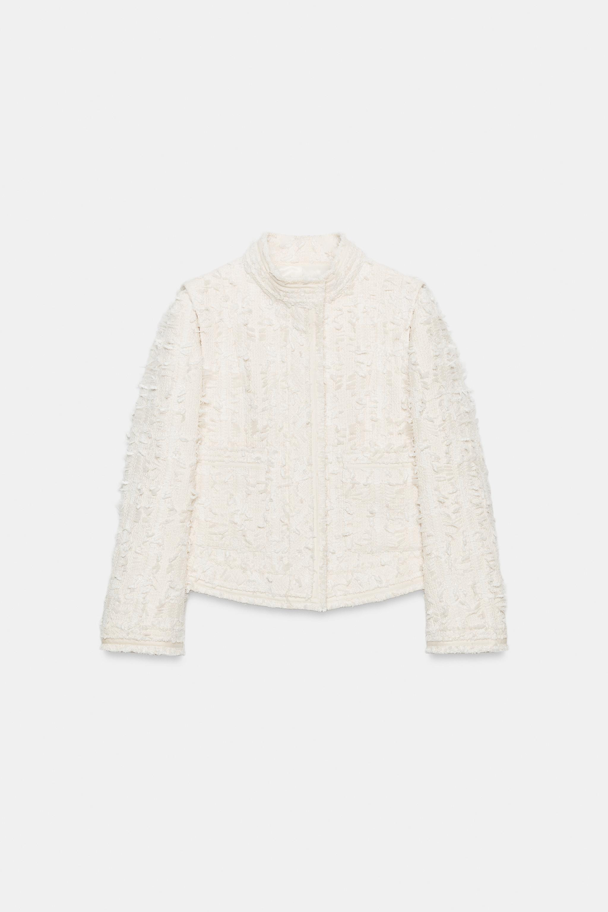 ZARA WOMAN COLLECTION. High-neck jacket with long sleeves. Patch pockets on the front. Features m... | Zara US