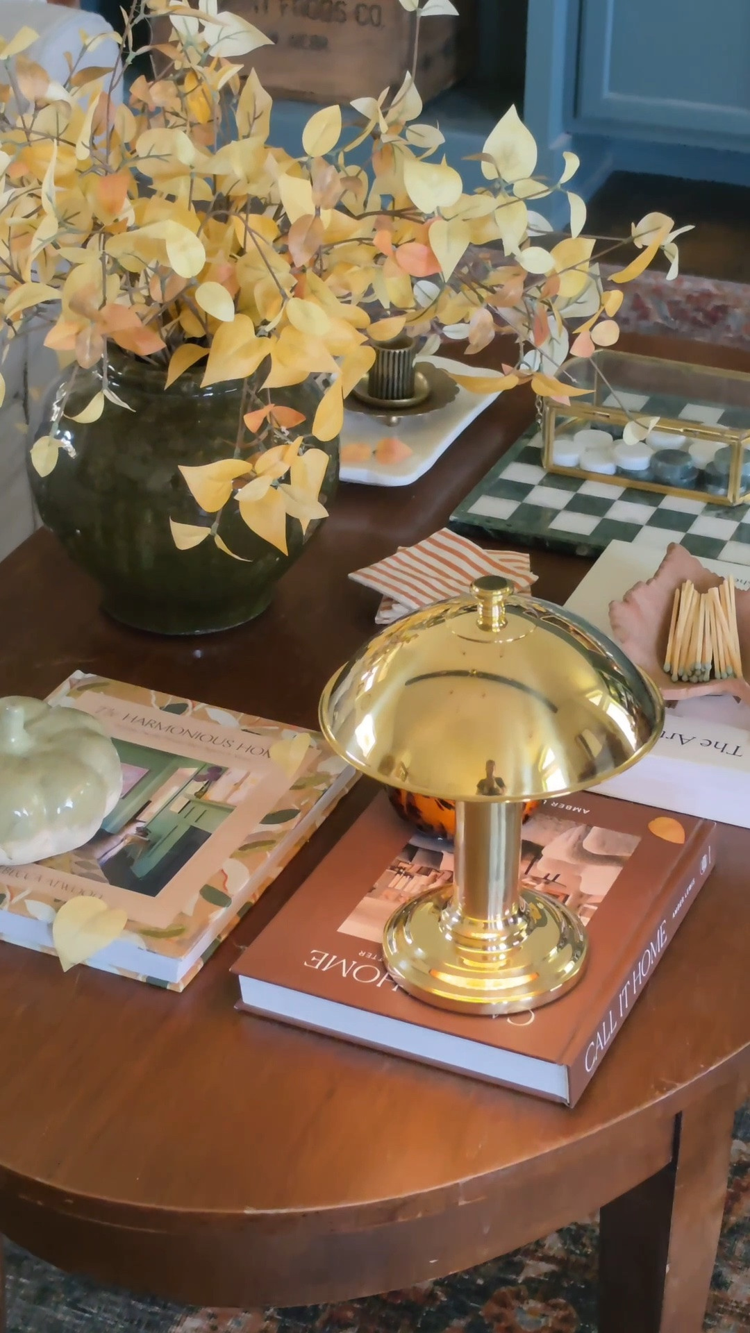For a cozy collected fall coffee table, layer in books, fall stems, some functional decor (checkers set) with a couple seasonal items.

#LTKSeasonal #LTKHome #LTKstorytime