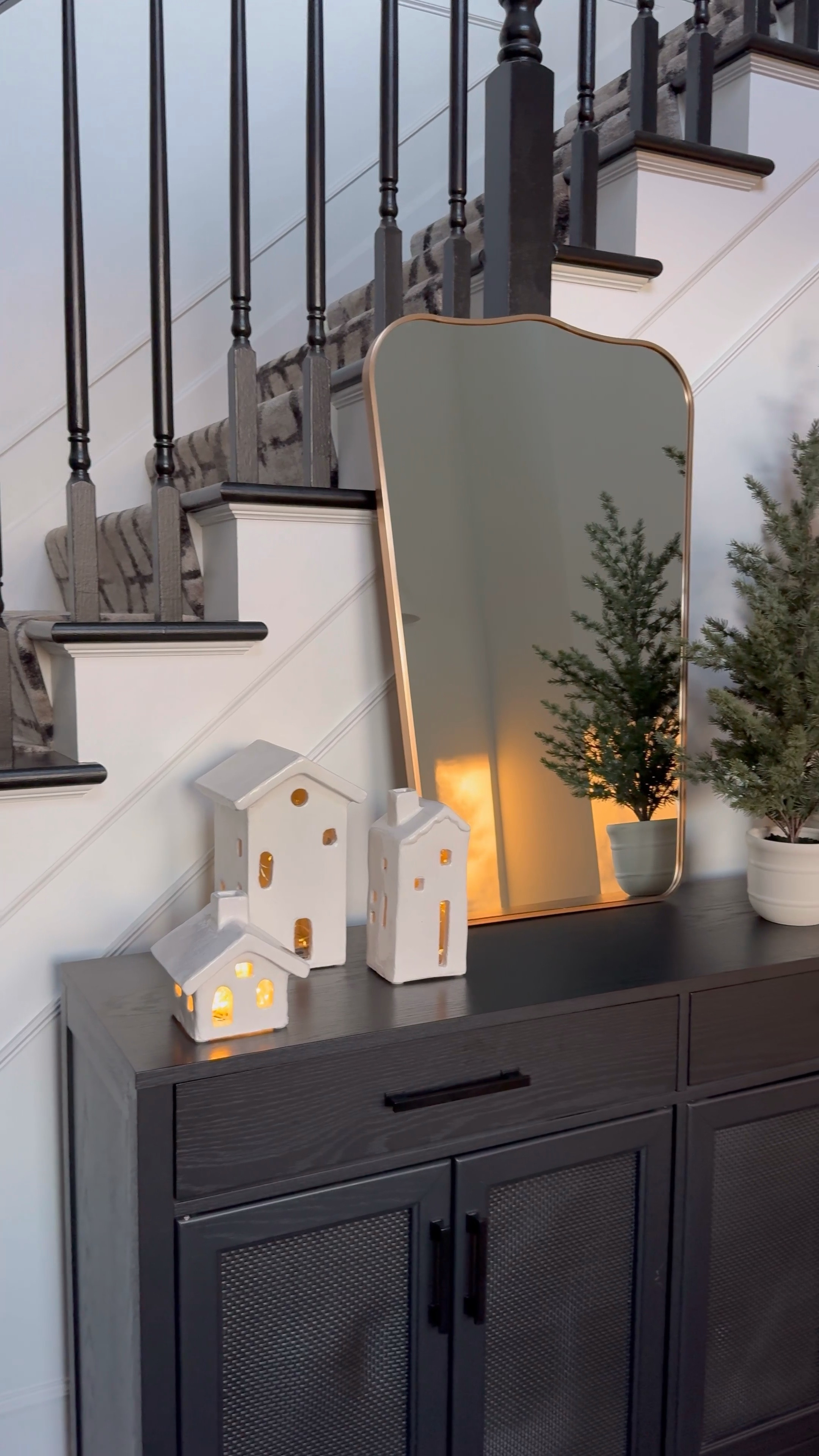 Shop my favorite Christmas village houses from pottery barn. I've had mine for years and we'll keep them for the rest of my life. They make me so happy and keep things neutral.

#ChristmasVillage #ChristmasDecor #ChristmasHouse #ChristmasHouses #ChristmasHome #ChristmasDecorations #Sideboard #BlackSideboard #ChristmasTree #ChristmasTrees #Mirror #GoldMirror #Garland #ChristmasGarland 

#LTKHoliday #LTKSeasonal #LTKHome