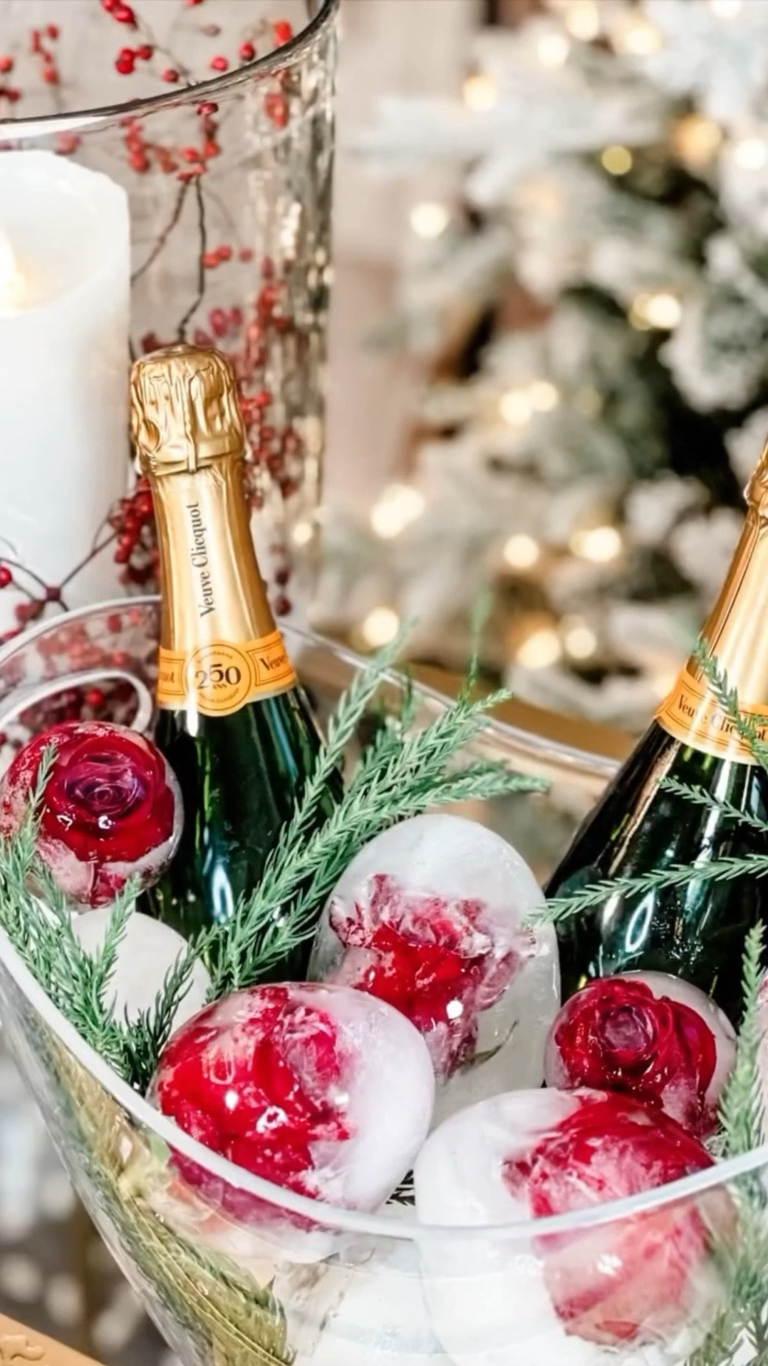 Holiday Floral Ice Spheres ❄️ I’ve brought back my popular floral ice spheres, which have garnered 65 million views, just in time for the holiday season! These frozen rose ice spheres are a beautiful way to add a festive touch while keeping your drinks chilled for Christmas and winter celebrations.

Enhance your table setting or party decor with a touch of sophistication, a burst of color, and unique elegance that is sure to leave a lasting impression on your guests!

To make them, follow these simple steps:

1. Cut the stems off fresh roses, leaving only the flower heads. (Faux flowers work too)
2. Take a 12” balloon or ice mold and insert a rose head into it. (You will need two sets of hands or a tool) 
3. Fill the balloon with water until it is the desired size. Make sure the rose head is fully submerged in the water. (Boiled water or distilled water will produce a clearer ice sphere however, you need the water pressure to properly fill your balloons) 
4. Tie the balloon tightly to prevent any water from  escaping.
5. Place the balloon in the freezer and freeze it for several hours or overnight until the water is completely frozen.
6. Once the ice sphere is frozen, remove the balloon by cutting it off with scissors or by running the frozen balloon under warm water for a few seconds until it peels away from the ice.
7. Arrange the ice spheres in a bowl or container and add ice or additional water spheres without flowers to fill any gaps between them.

Your ice spheres should last for at least several hours. 

#LTKHoliday #LTKHome #LTKParties