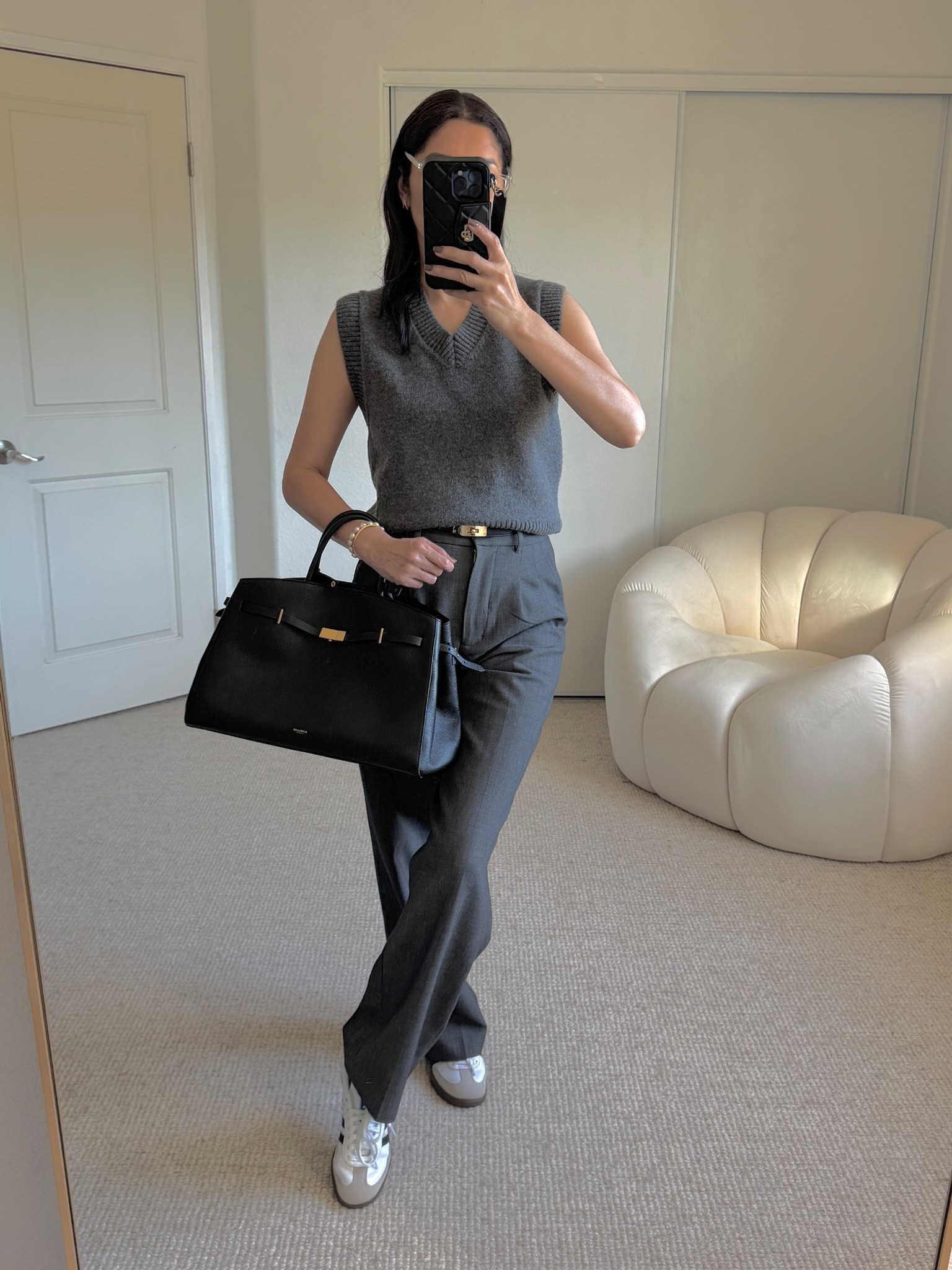 Autumn Outfit Ideas 🍁
STYLING GREY + ADIDAS SAMBA SNEAKERS
.
OUTFIT IDEA DETAILS: 
-Wearing zara vest sweater size S
-Trousers size 4 Regular
-Demellier Hudson bag
.
This season is all about smart layering — think trench coats, blazers, and soft cashmere knits that elevate any look. Add a vest or cardigan for extra warmth, and you’ll be ready for those unpredictable autumn days. Here’s your reminder that effortless layers are the secret to looking polished no matter the temperature.

Save this for your next autumn outfit inspo!

🧥 #AutumnOutfitIdeas #FallOutfits #LayeringLooks #TrenchCoatSeason #fallstyleinspo 
#outfitideas #stylingtips #whattowear

🗝️ style styling autumn fashion ideas styling inspiration outfit inspiration ootd high street style outfits smart casual outfit autumn style workwear ideas outfitinspo casual style autumn outfit what to wear affordable fashion fall fashion ideas ootd work outfits capsule wardrobe, fall outfit ideas