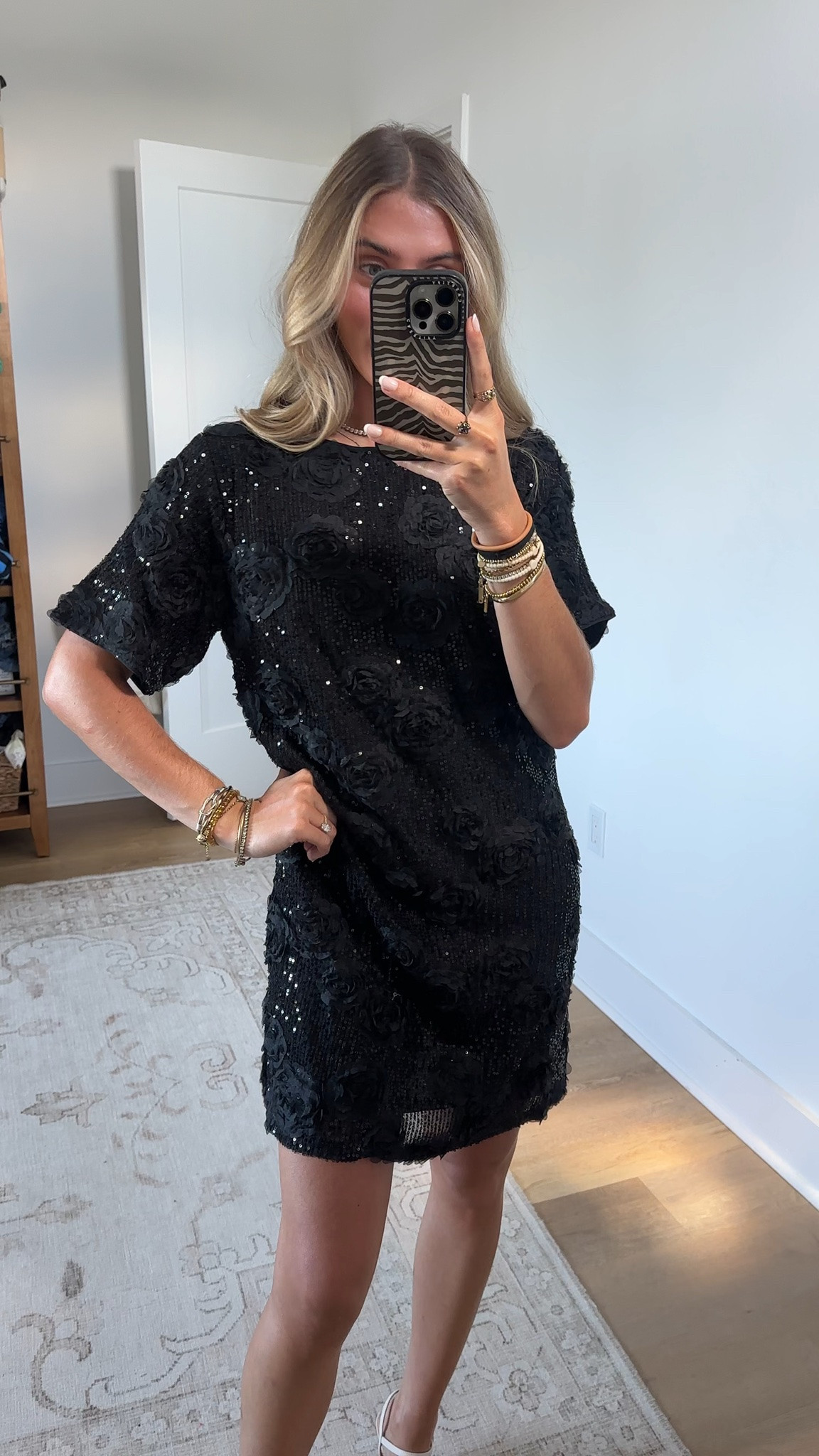 Baltic born size xs dress. My code is SLOANE15. The Rhea Sequin Short Dress is a sparkling, short-length shift crafted for parties and special occasions. A black base is layered with silver sequins and delicate black appliqué mesh florals that catch the light and add subtle movement. The dress is fully lined for comfort and finished with a round neckline and short sleeves for an elegant, easy silhouette.

@balticbornclothing wedding guest dress, wedding dress, formal dress, maxi dress, event dresses, prom dress, winter wedding guest dress, spring wedding guest dress, summer wedding guest dress, fall wedding guest dress, dresses under $100, under $100 dresses. #balticborn #balticbornpartner

#LTKootd #LTKWedding #LTKSaleAlert