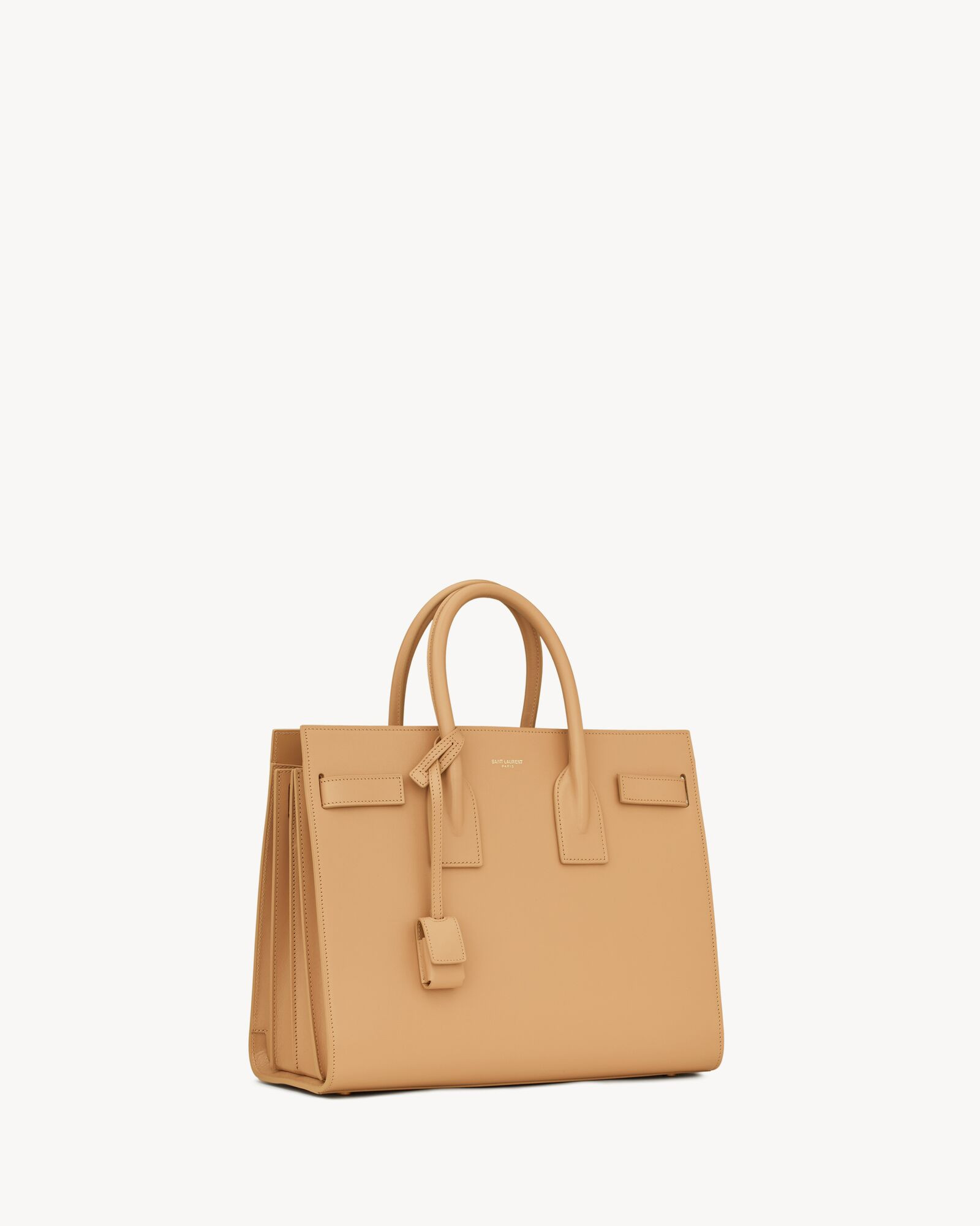 Sac de jour bag in its iconic size.SPACIOUS and leather-lined, it features two compartments separ... | Saint Laurent Inc. (Global)