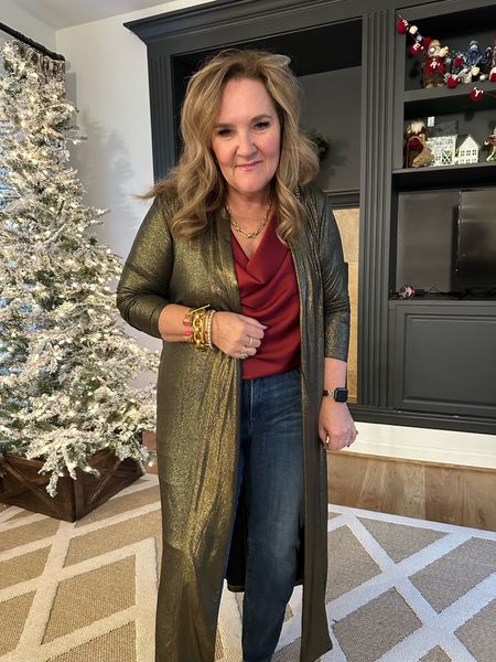 Holiday casual outfit idea. 

Love this lightweight gold duster. It’s a knit and really lightweight. Use code NANETTE10 10% off WEARING A LARGE 

Satin shell is a great staple! Wearing an XL

jeans size 2.0

#LTKHoliday #LTKfindsunder100 #LTKover40