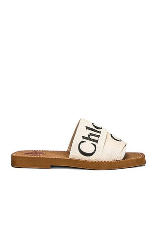 Chloe Woody Flat Slides in White - White. Size 35 (also in 36). | FWRD 