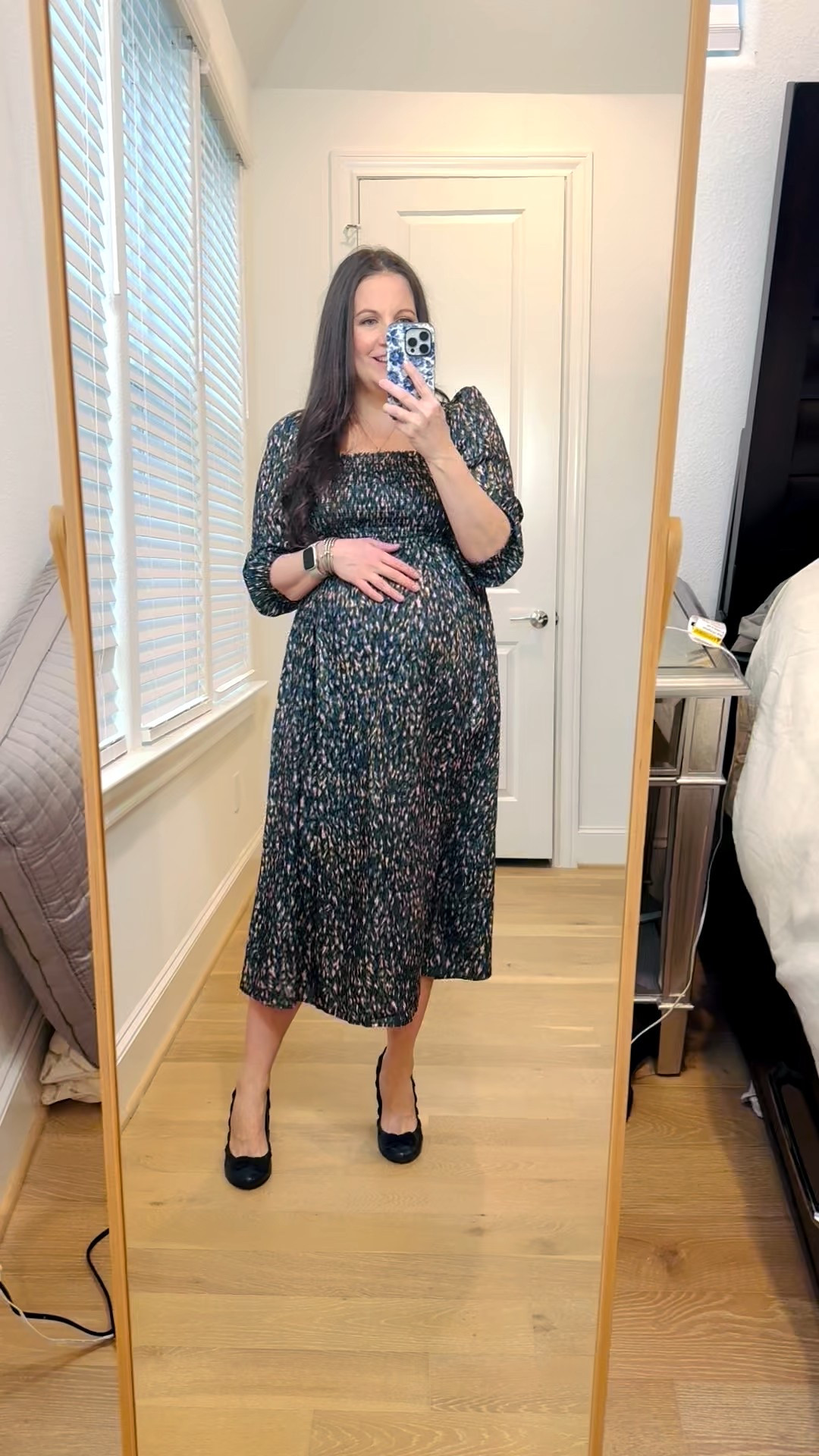 This silky sateen maternity dress with a smocked bodice and elastic cuffs on the sleeves has been one of my most versatile finds this season. It’s the perfect maternity work outfit that easily transitions into a polished winter outfit for special occasions. The soft blue print dress is flattering, comfortable, and bump-friendly without feeling restrictive.

I’ve worn this as a chic holiday dress, styled it as a classic wedding guest dress, and even dressed it up for the office with sleek navy heels. If you’re looking for one dress that truly does it all during pregnancy, this one is such a good investment.

Linking everything below so you can shop this elevated maternity style! 


#LTKHoliday #LTKBump #LTKWorkwear