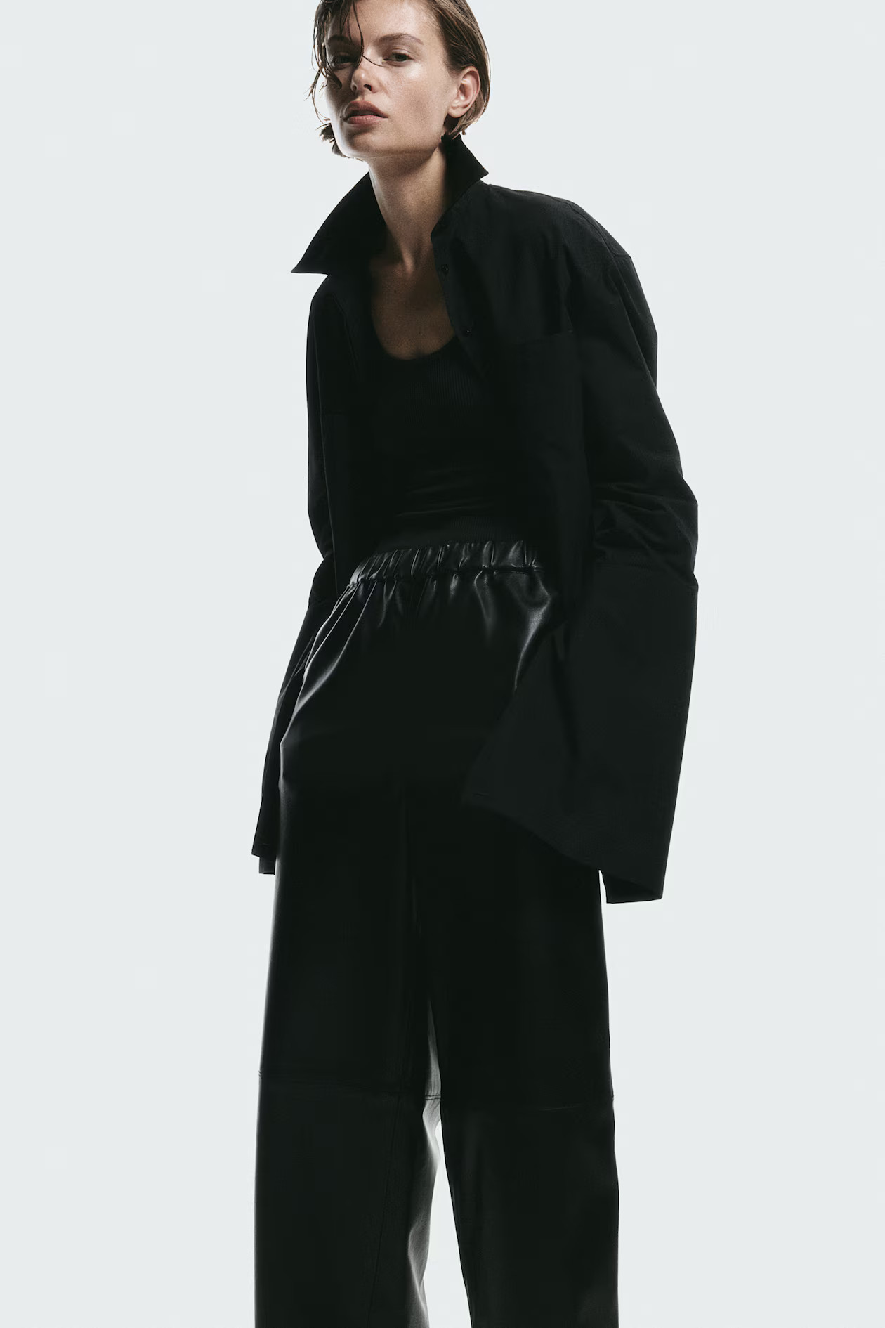 Coated trousers - Regular waist - Ankle length - Black - Ladies | H&M GB | H&M (UK, MY, IN, SG, PH, TW, HK)