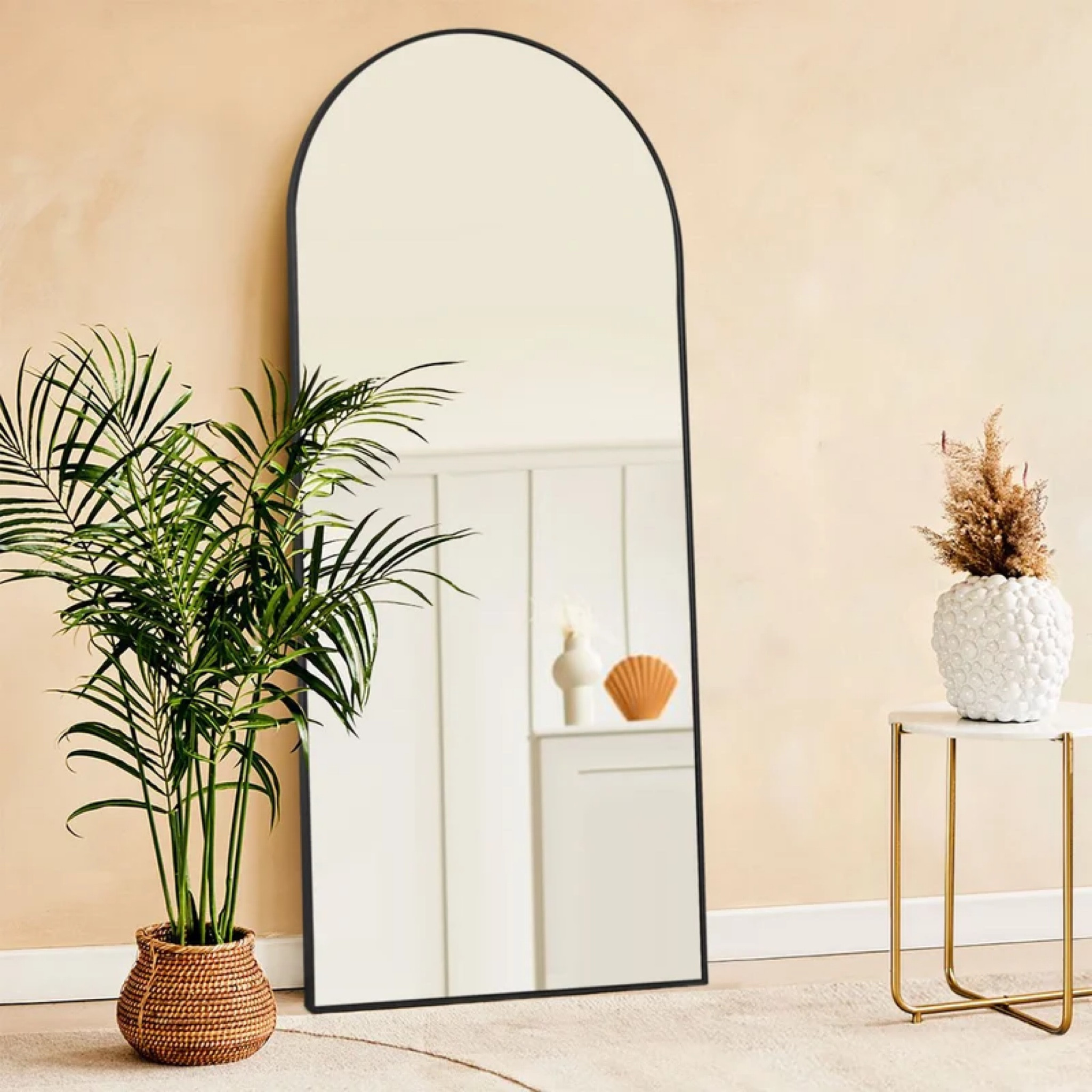 Black trimmed full length mirror.

#LTKhome #LTKstyletip #LTKFind