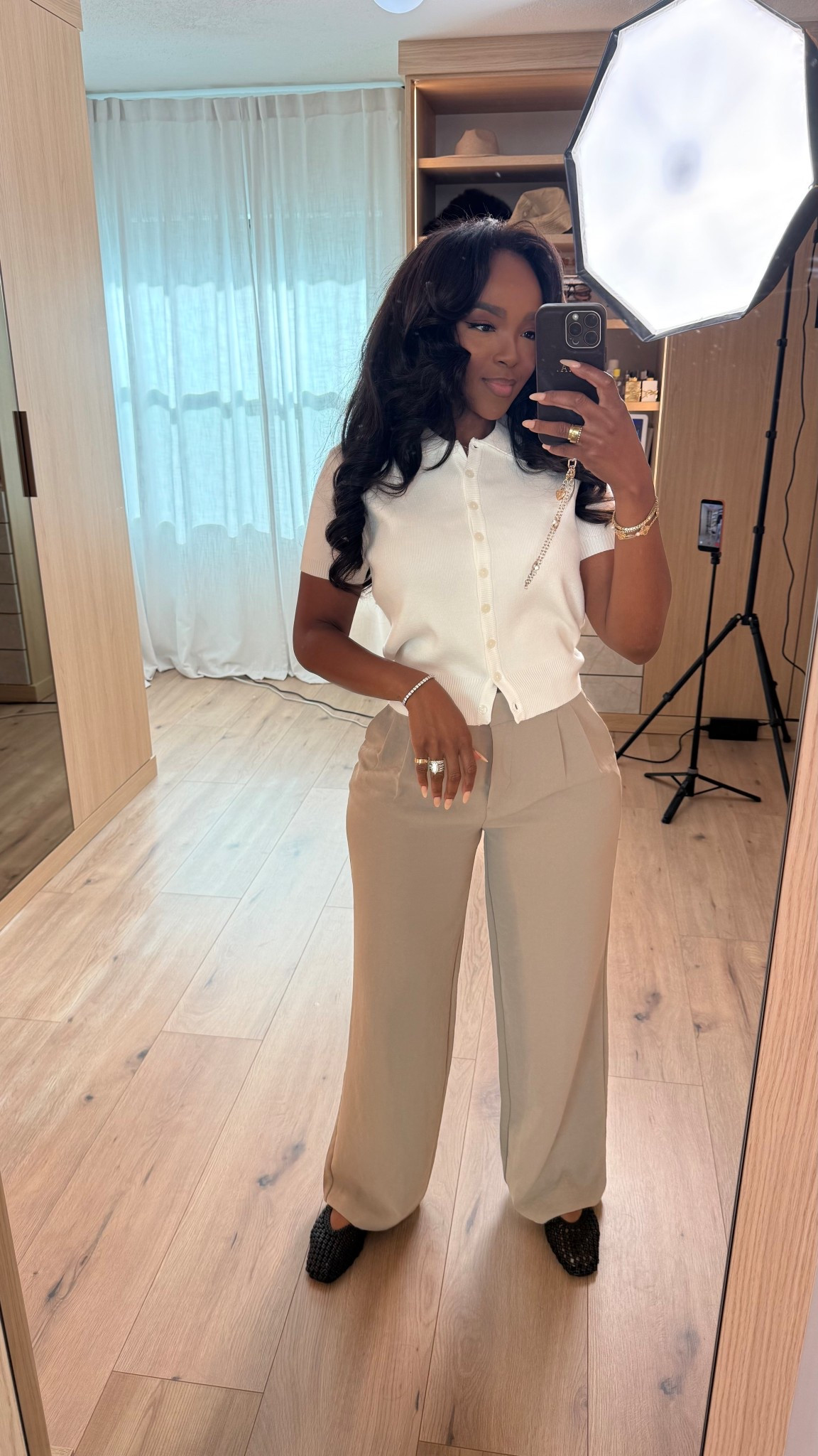 Scroll to shop this polished neutral outfit 🤍

A fitted short sleeve knit paired with tailored trousers is one of those timeless looks you can style so many ways—dress it up with heels or keep it minimal for everyday, making it a staple where the cost per wear keeps dropping.

Perfect for work, meetings, lunch dates, or everyday chic looks.

📏 Measurements: 5’4”, 140 lbs, 34D bust, 27” waist, 40” hips

Follow me on Instagram and YouTube @kirasfashionfind