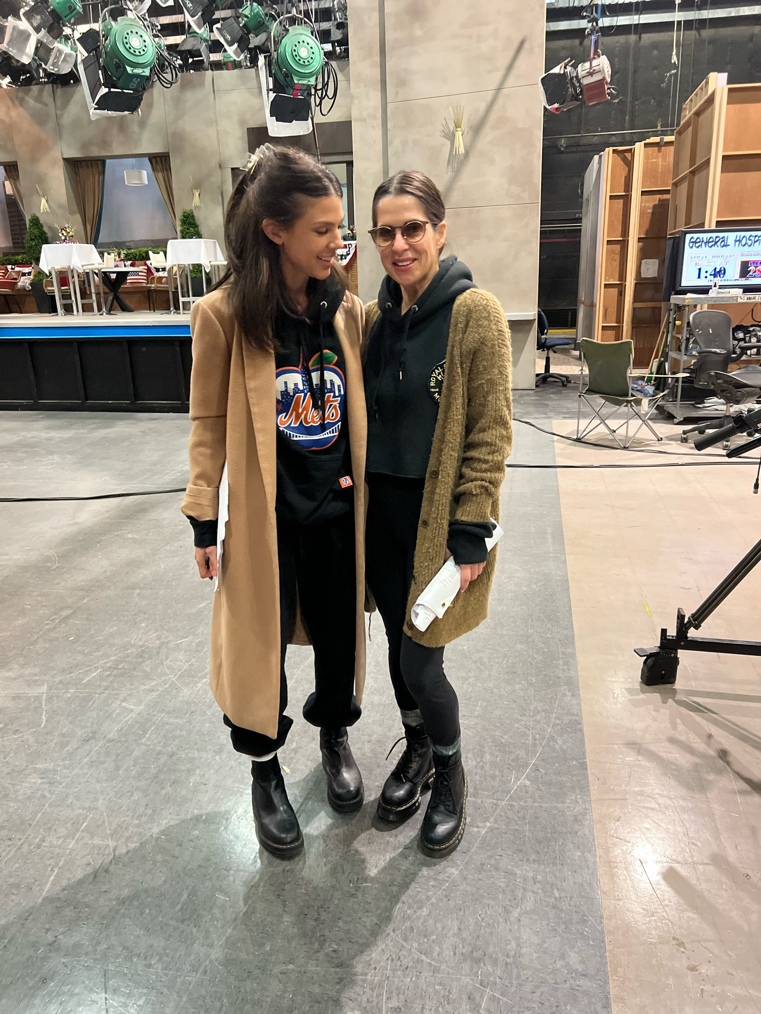 Streetwear athleisure • Long camel peacoat, Mets sweatshirt, black sweatpants, black boots • 

#LTKfit #LTKstyletip #LTKtravel