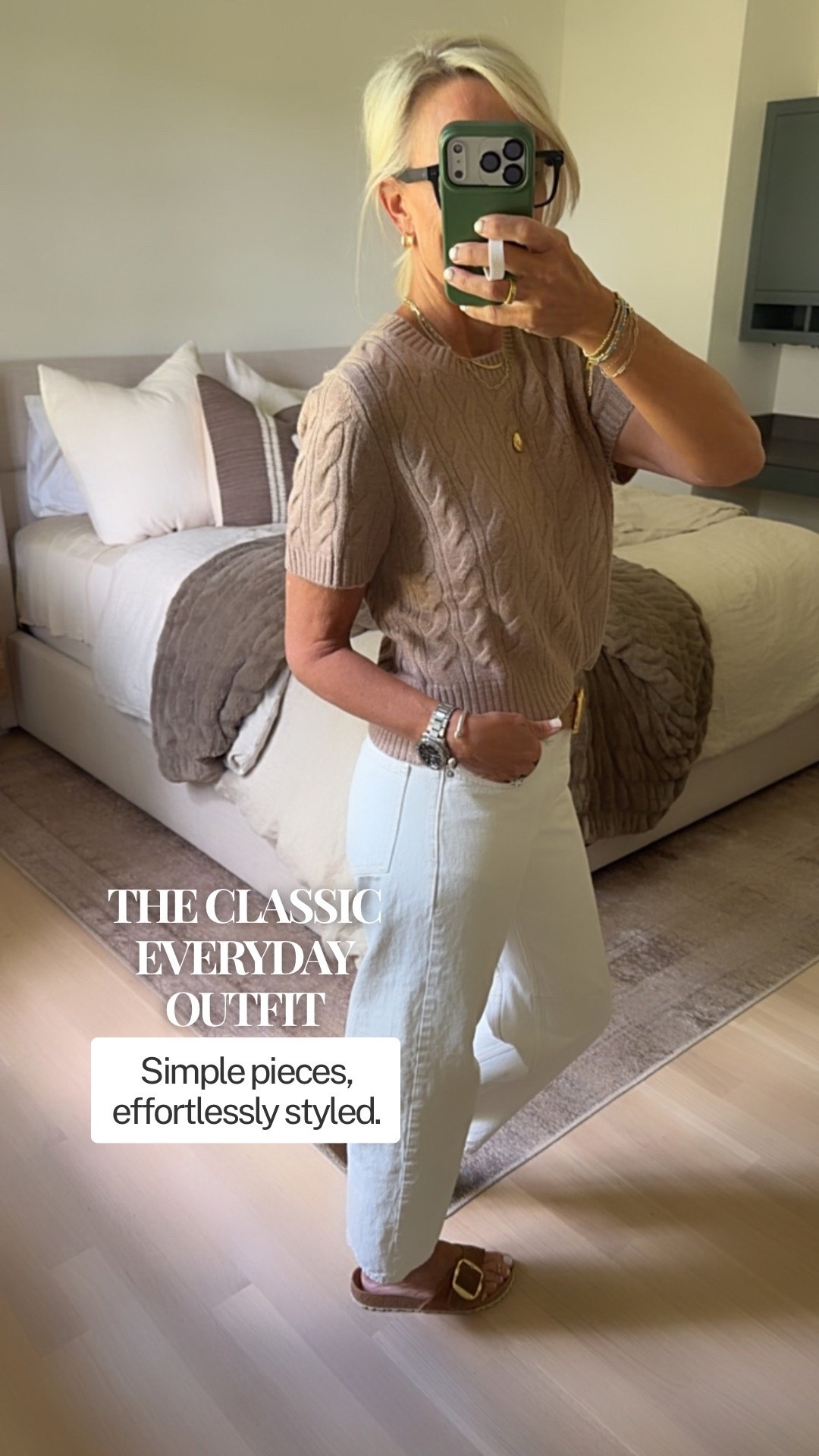 Some of the best everyday outfits are built around simple, classic pieces. I love this taupe cable-knit short-sleeve sweater paired with white jeans for an easy, polished look. The warm neutral tones feel timeless and work beautifully for lunch, errands, or a casual day out.
The sandals pictured are no longer available, so I’ll be tagging another shoe option that works just as well with this outfit!