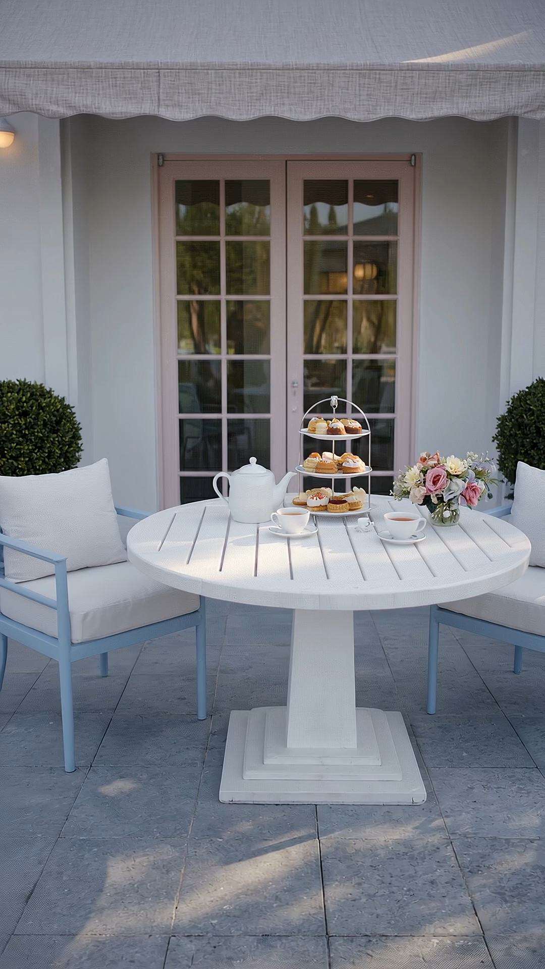 Afternoon tea time outdoors. ☕️🌸 There’s something so timeless about setting the table for tea and dessert outside — relaxed enough for an afternoon at home, yet polished enough to make the moment feel special.

The Hampstead Round Dining Table is the centerpiece of this setting. I especially love its crisp white finish and sculptural pedestal base — substantial and architectural, yet the round silhouette keeps the overall look clean, graceful, and inviting. It has that wonderful balance of classic design and modern simplicity that works beautifully for outdoor entertaining.

Paired with the Parma Dining Armchairs in soft coastal blue, the setting feels even more refined. Their powder-coated frames and tailored silhouettes bring a classic-meets-modern character, while the blue adds just enough color against the white table. Finished with a tiered cake stand, teaware, dessert plates, and a romantic floral arrangement, it’s an elegant outdoor setting made for lingering over afternoon tea.

Serena & Lily Labor Day Sale — up to 40% off everything, ends today. Don’t miss the final opportunity to save on outdoor dining, tabletop, and entertaining favorites.

#AfternoonTeaTime #LaborDaySale #OutdoorDining #HampsteadRoundDiningTable #ParmaDiningArmchair #CoastalChic #ModernClassic #Tablescape #Tabletop #Tableware #Dinnerware #OutdoorEntertaining #EntertainingAtHome #Dessert #DessertPlate #CakeStand #OutdoorFurniture #PatioStyle #SerenaAndLily

#LTKHome #LTKSaleAlert #LTKdayinmylife #LTKdayinmylife #LTKHome #LTKSaleAlert