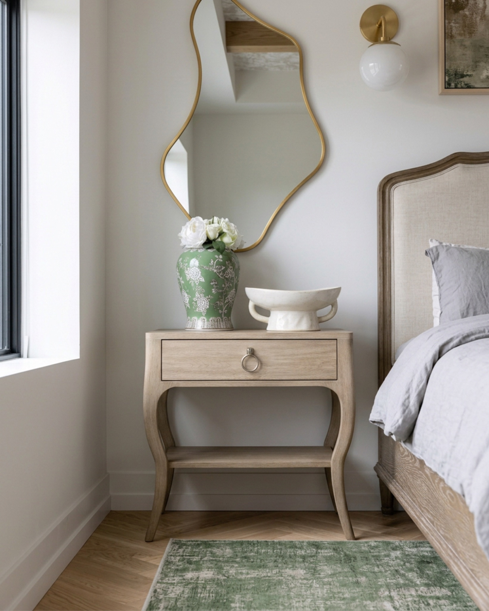 Shop the look:
* Upholstered wood-trim bed frame
* Organic wavy brass mirror
* Boucle bench
* Boucle arch ottoman
* Boucle wedge ottoman set
* Chunky knit throw blanket
* Green velvet lumbar pillows
* Green graphic throw pillows
* Abstract framed wall art
* Abstract black and white wall art
* Floral botanical framed art
* White glass globe pendant light
* Oversized globe pendant light
* Wood beam ceiling
* Floral printed ceiling wallpaper
* Brass wall sconces
* Brass and glass globe sconce
* Vintage-style nightstands
* Marble slab fireplace surround
* Oak wood block coffee table
* Wood-framed accent chairs (pair)
* Slipcovered sofa
* Ribbed glass cabinet doors
* Sage green built-in cabinetry
* Reclaimed wood console table
* Vintage medallion runner rug
* Layered vintage rugs
* Floral ginger jar table lamp
* Green deer figurines
* Ceramic pitcher vase
* Chinoiserie floral ceramic vase
* Faux cherry blossom stems
* Purple veined marble countertop
* Moody marble backsplash
* Antique brass drawer pulls

#LTKsale #LTKhome #LTKstyletip