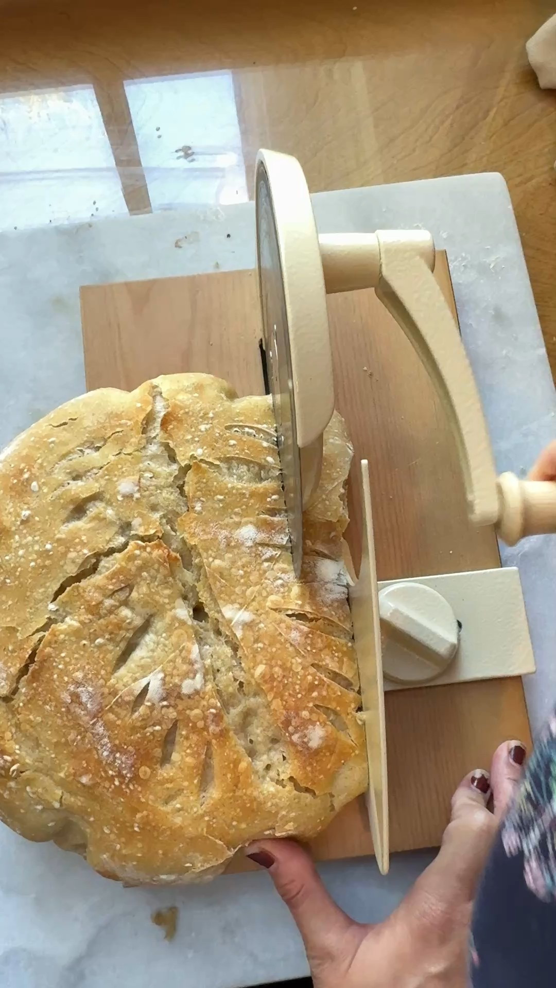 this bread slicer is so nice! This loaf of sourdough was warm and is typically tough to cut with a knife right out of the oven but this makes it so easy. I use it to slice anything I bake, bagels, English muffins, hamburger buns. #sourdough #baking 

#LTKHome