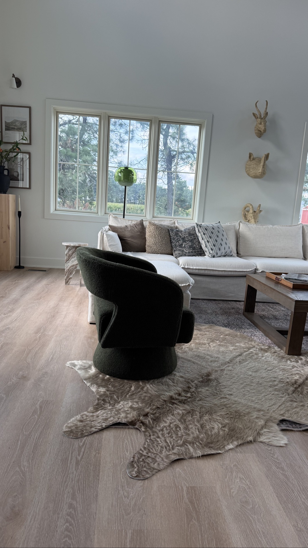 One thing I do when I start transitioning to fall is not add pumpkins but to layer rugs.  I wish you could feel this cowhide: so soft!

#LTKHome #LTKSeasonal