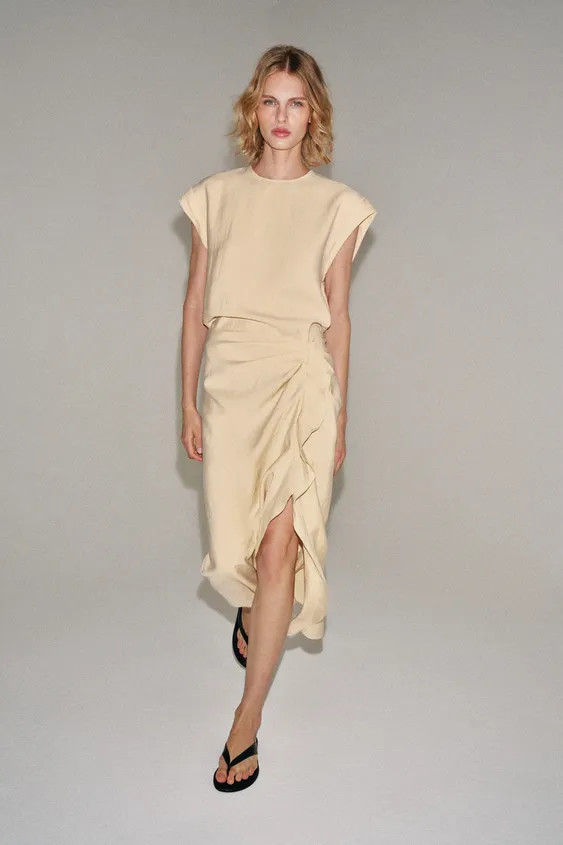 ZARA WOMAN COLLECTIONMidi dress made from a viscose blend yarn. Round neck and dropped armholes. ... | Zara Canada