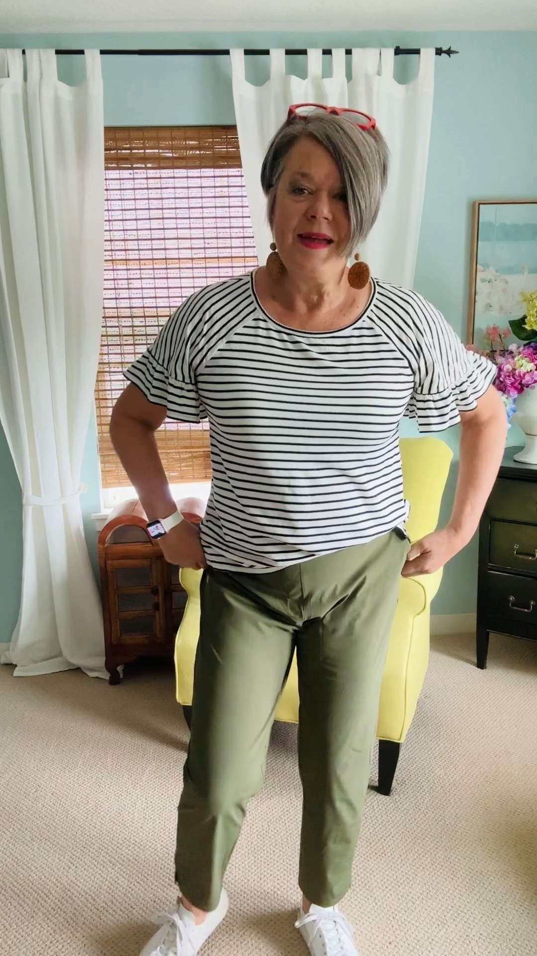 #ootd a cute striped top with ruffle sleeve #nordstromrack so comfy and can be dressed up or down. I am wearing the most comfortable “golf” pants from #amazon. Perfect for travel or any time! Wide smooth elastic waistband white sneakers, Pop on denim jacket if it gets chilly. 

#LTKMidsize #LTKTravel #LTKStyleTip