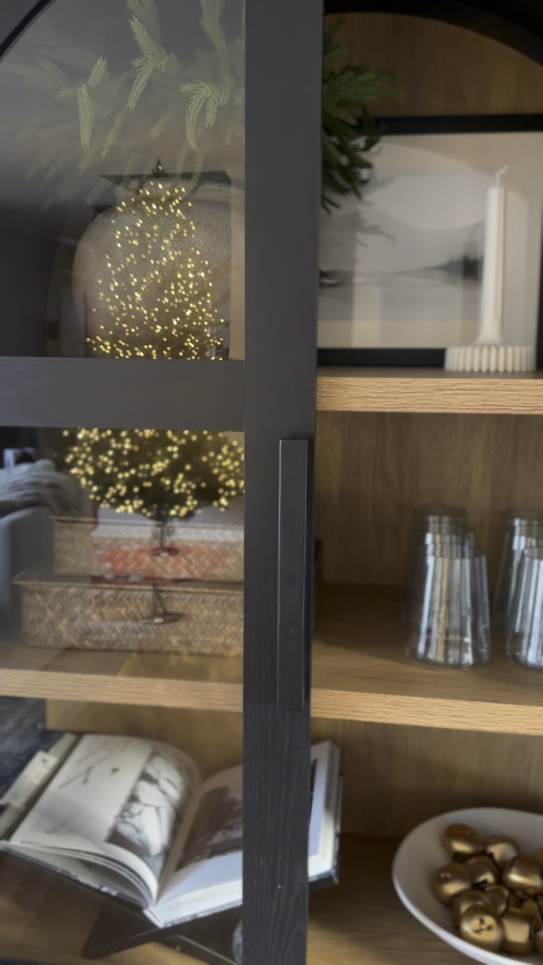 The reflection of the tree in my arched cabinet 🤩

#LTKSeasonal #LTKHome #LTKHoliday
