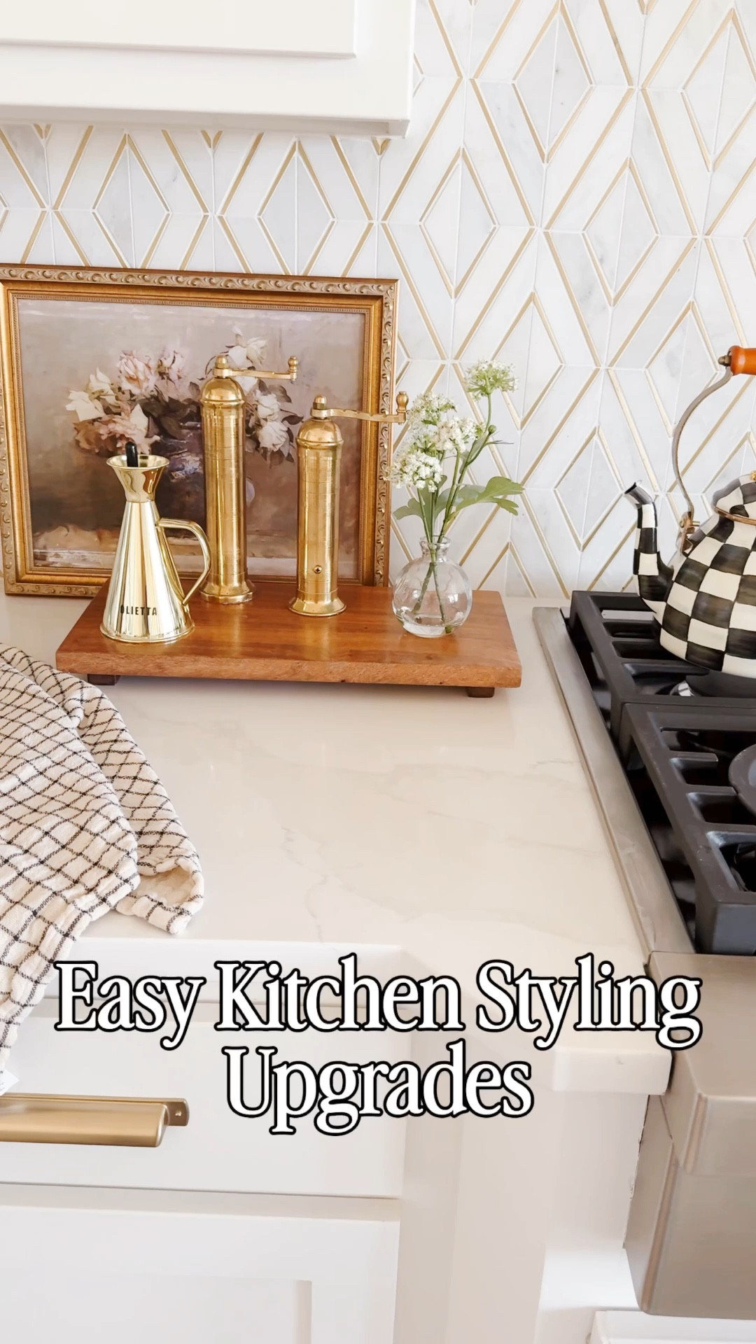 Neutral kitchen styling with brass accents and warm wood decor creates an elevated everyday space that feels both functional and beautiful. This marble backsplash kitchen design paired with layered counter styling, vintage inspired brass pieces, wood pedestal tray, and simple floral stems is perfect for a cozy modern home refresh. If you love neutral home decor, kitchen counter styling ideas, and affordable designer inspired finds, this look is an easy way to upgrade your space. Follow me on LTK for daily home decor, Amazon finds, and styling inspiration.

#LTKHome #LTKSaleAlert #LTKvlog