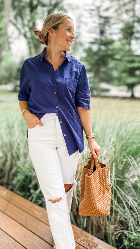 Loving this vibe. White 90s denim and a navy blue linen top paired with neutral, cognac sandals and a statement bag. Effortless and classic! 

#LTKFind #LTKstyletip #LTKunder100