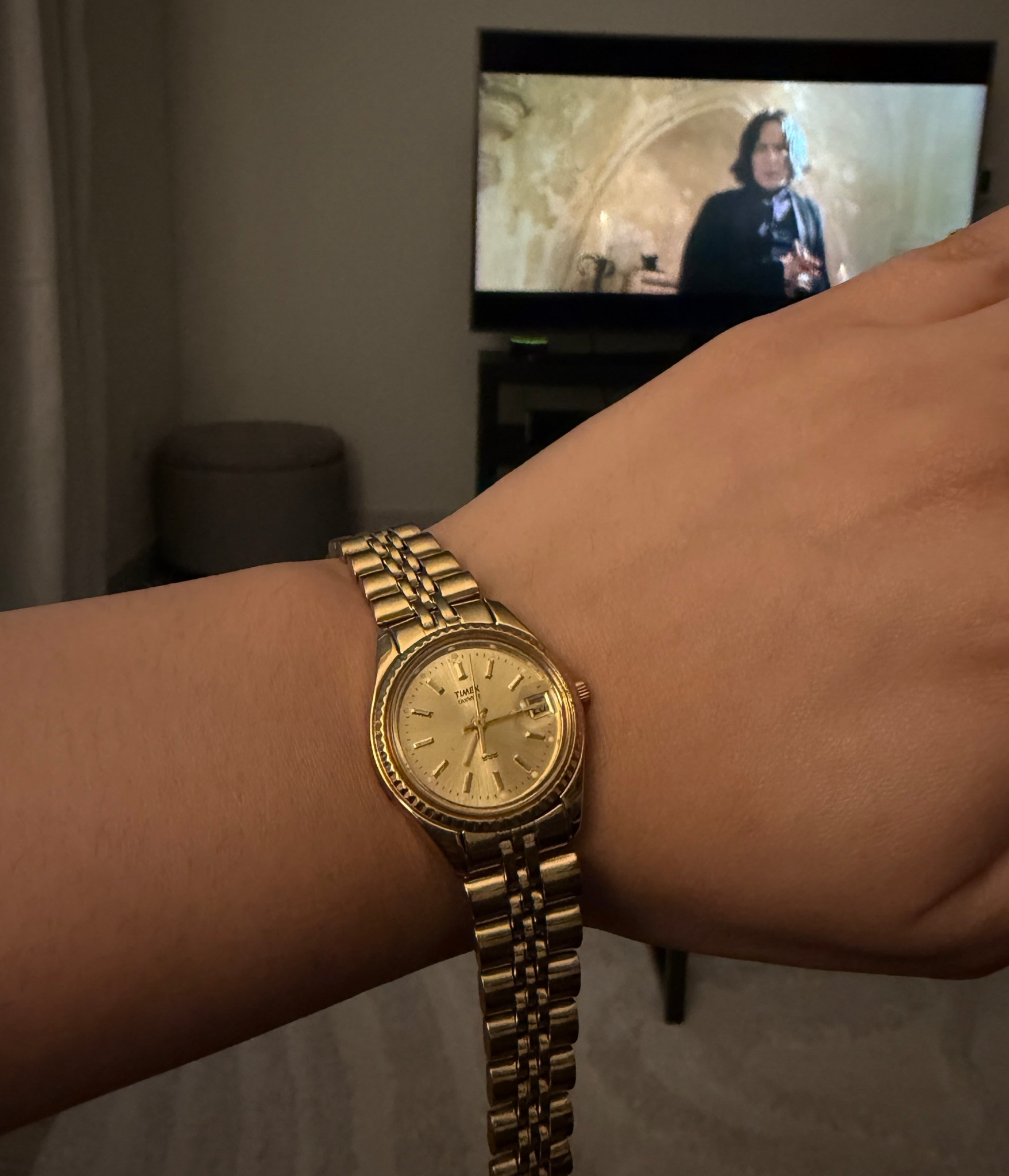 Found one of my vintage Timex watches 💕 the band clasp is broken I need to get it fixed asap. Such a perfect watch. Professor snape in the background is loving it too 😂  

Timex Legacy 25mm gold watch with date 🤍

#LTKdayinmylife