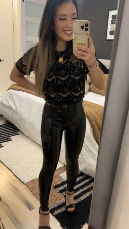 Going out outfit 
Amazon sequin top -XS / TTS 
Spanx patent leather leggings -XSP / runs small 
Black platform sandals - 5.5 / size up 

#LTKfindsunder100 #LTKparties #LTKover40