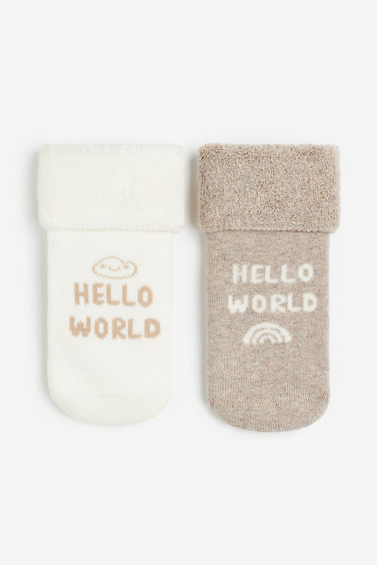 2-pack terry socks - Beige/Hello World - Kids | H&M GB | H&M (UK, MY, IN, SG, PH, TW, HK)