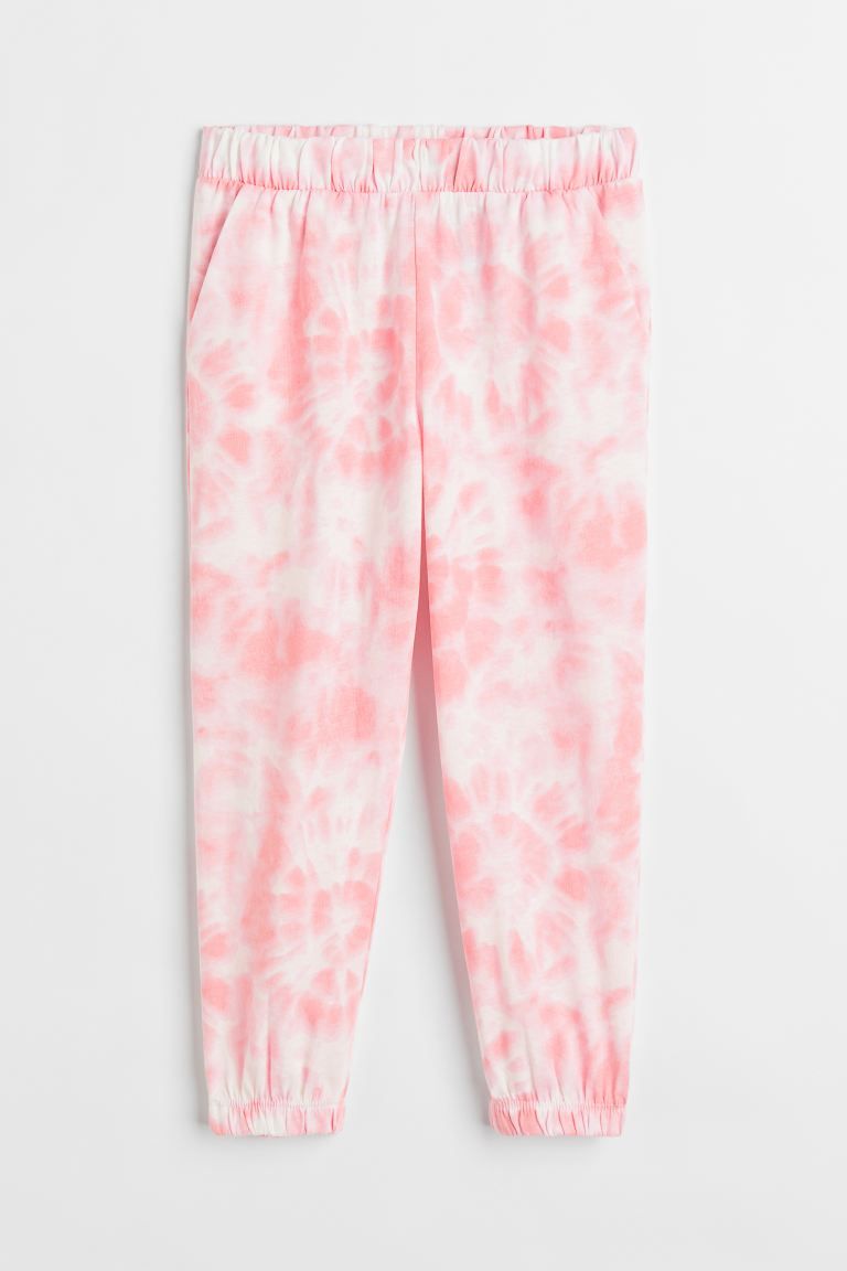 Joggers in jersey. Covered elastic at waistband, diagonal side pockets, and covered elastic at he... | H&M (US)