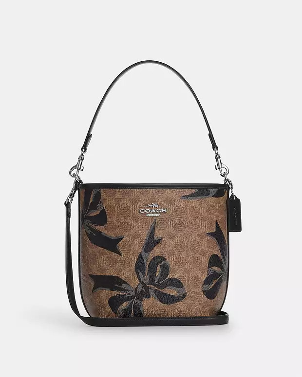 City Bucket Bag In Signature Canvas With Bow Print | Coach Outlet US