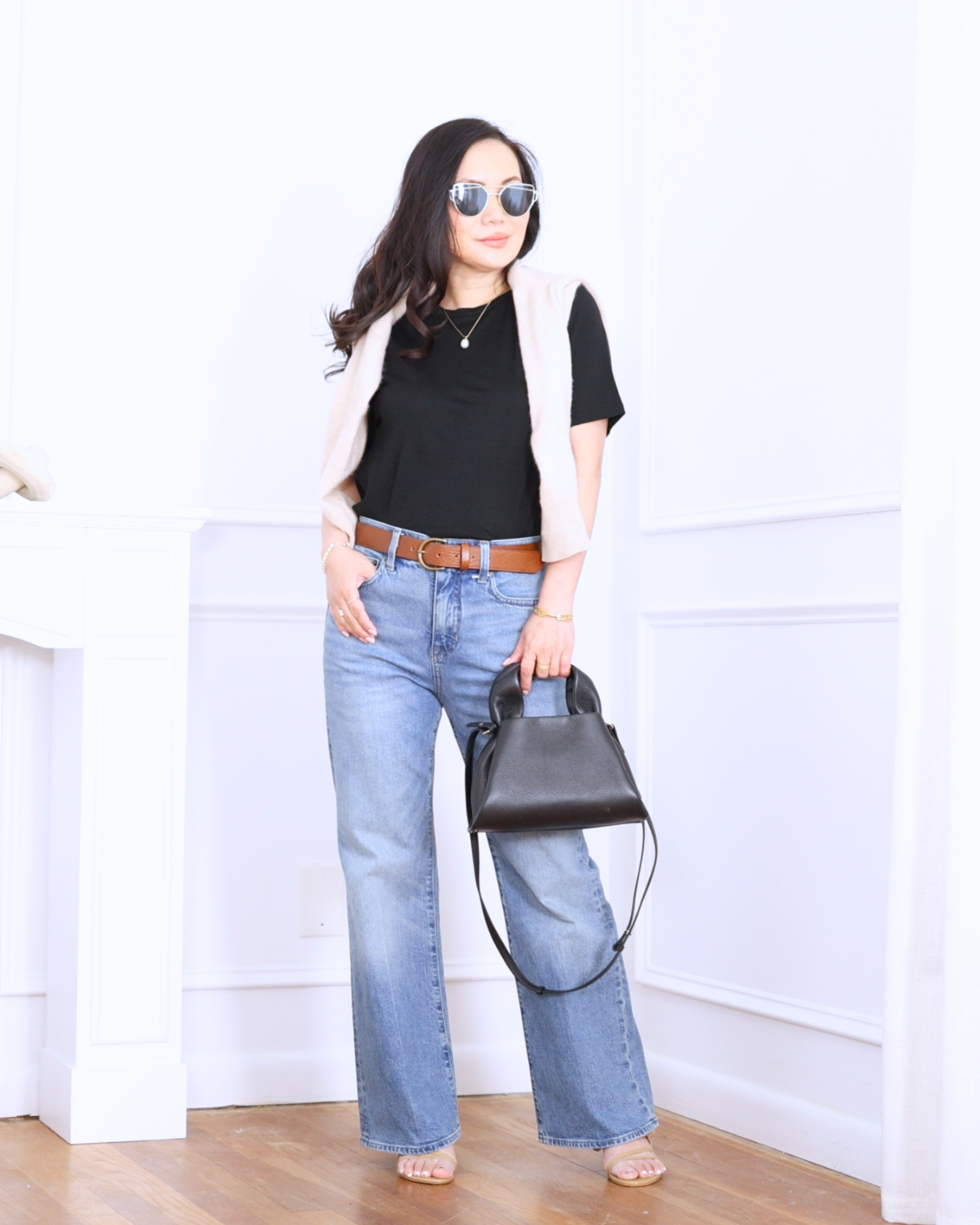 Black tee from Unbound Merino paired with J.Crew kick-flare jeans — simple, flattering, and effortlessly cool for an easy everyday look. I'm 5'2, wearing size S. 

 #LTKootd #LTKOver40 #LTKPetite