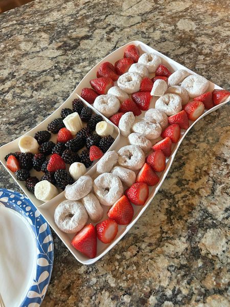 These Red, White & Blue Breakfast Skewers were a hit for the entire family, and perfect for 4th of July.
Super easy to assemble using berries and powdered donuts. We paired with some yogurt for some added protein. 

Tray is from Target Bullseye, but this can be replicated with a plain white or other festive tray.

Replicate for dessert by subbing angel food cake and drizzling with white chocolate. Yumm!

#LTKfamily #LTKSeasonal #LTKhome