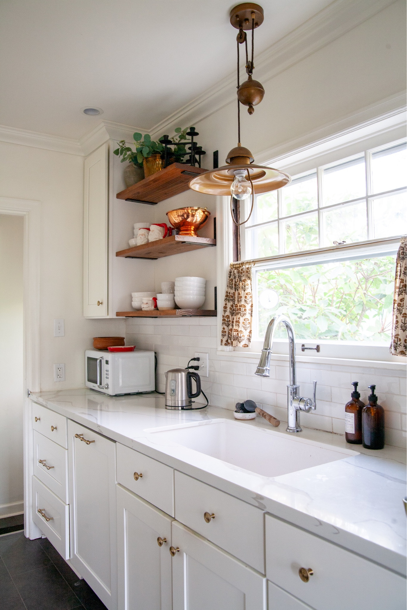 I almost never share this kitchen anymore, since I am pretty bored by at this point (2019 reno), but it looks a lot more interesting and cheerful with some red from the Christmas dishes. Making me happy today. The kids are with their dad and I’m having a quiet day at home which I’m trying to enjoy. I think I’m going to try watching some Hallmark Christmas movies now. Hope you are having a wonderful Christmas so far!

#LTKSeasonal #LTKhome