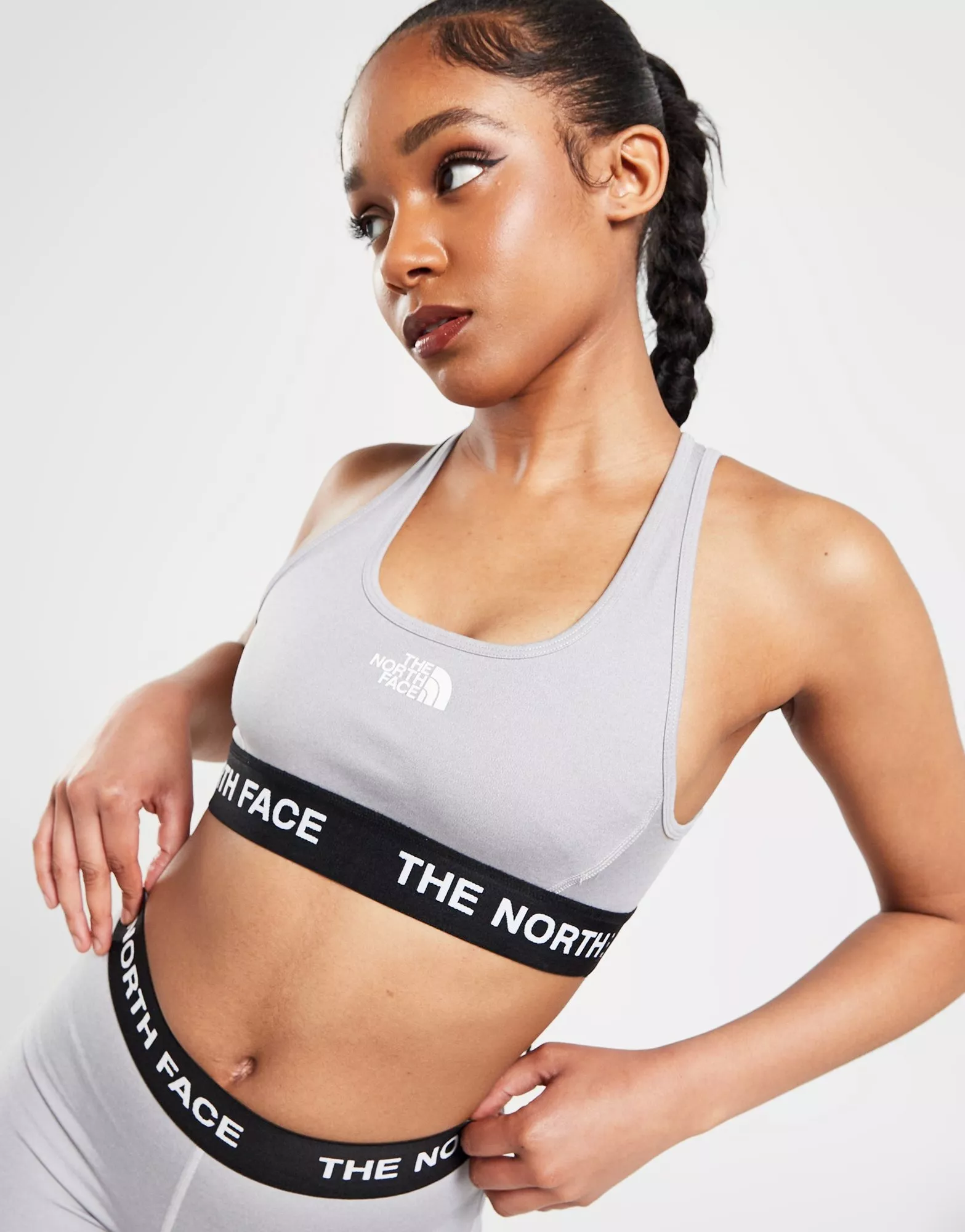 The North Face Training Tech sports bra in pink Exclusive at ASOS