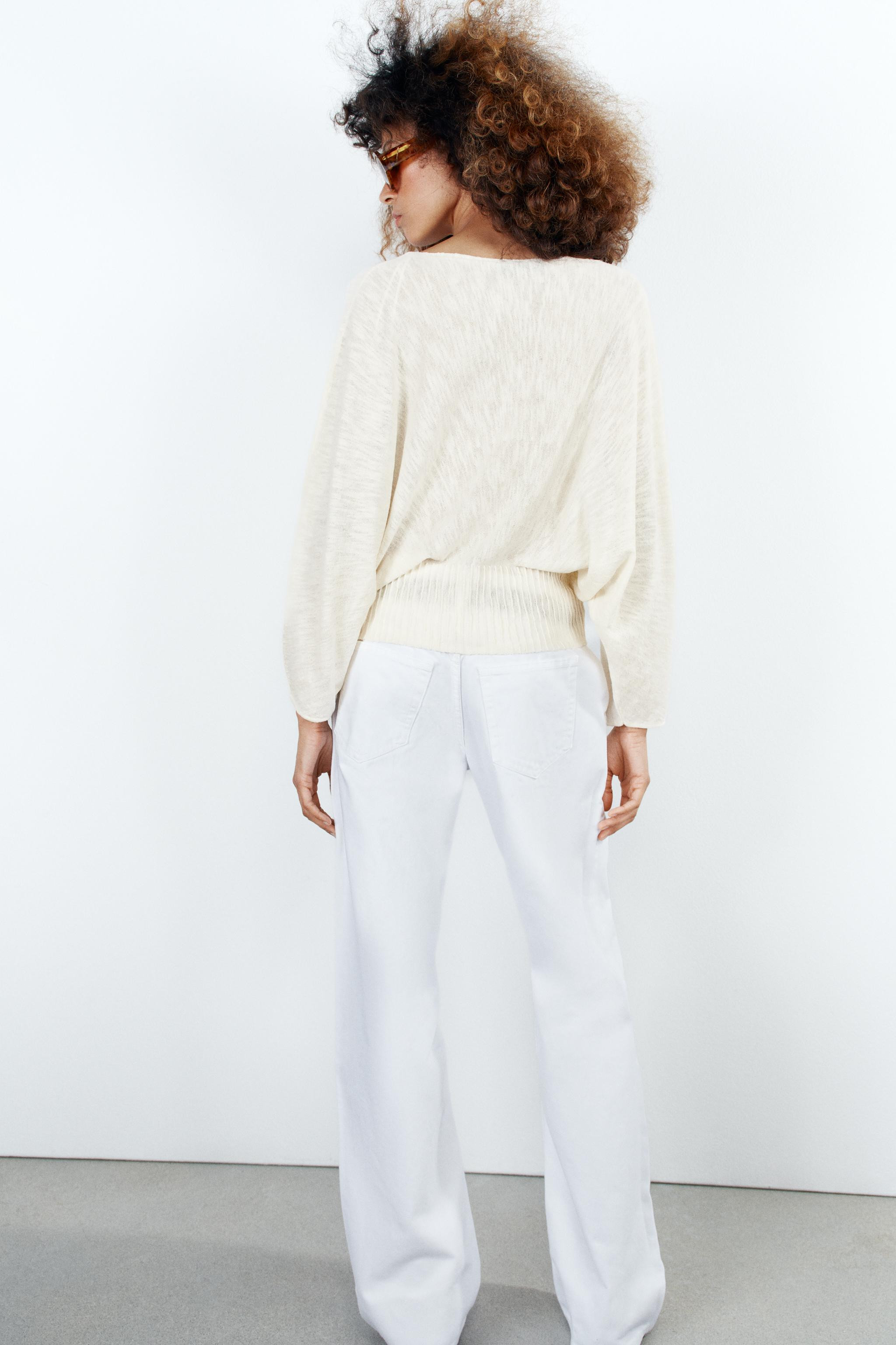 Boat neck jumper with long, drop-shoulder sleeves. Features a fitted, combined hem. | Zara US