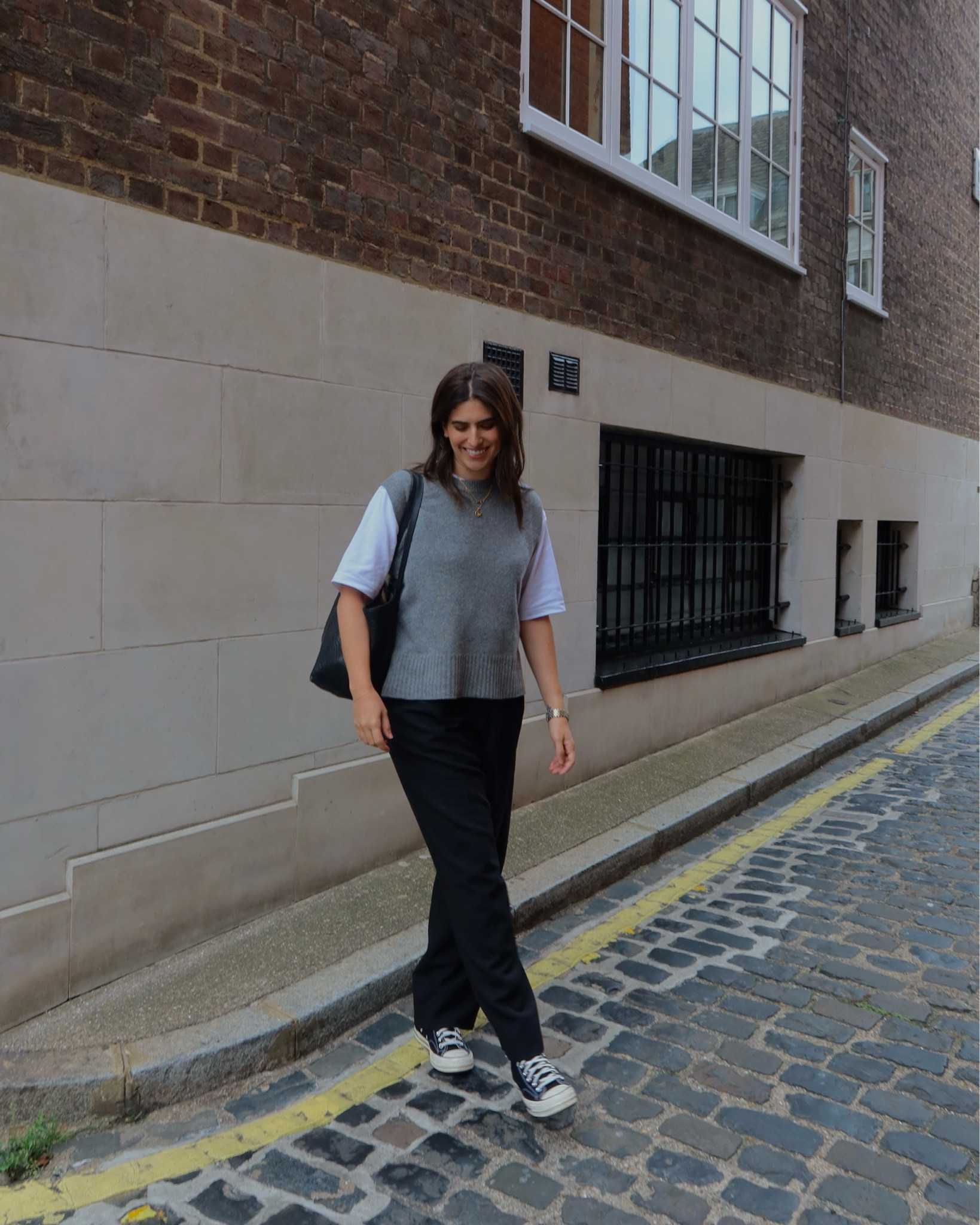September London outfits. Knitwear. Layering. Vest top. Uniqlo men’s t shirt. Hobo bag. Black trousers. Monochrome. 

#LTKeurope #LTKstyletip #LTKSeasonal
