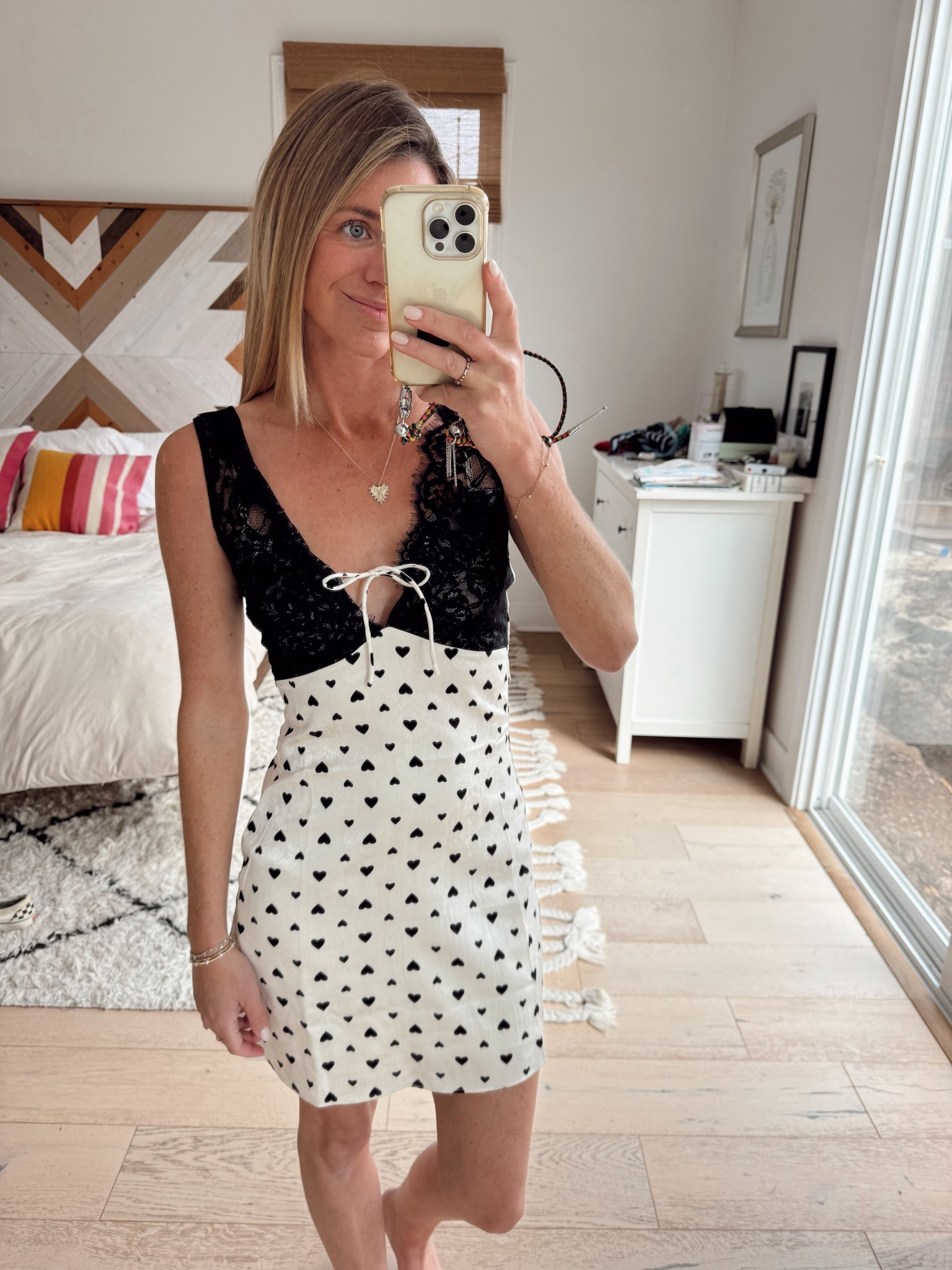 Black and white heart print and lace mini dress 

#LTKPetite #LTKSeasonal #LTKValentine