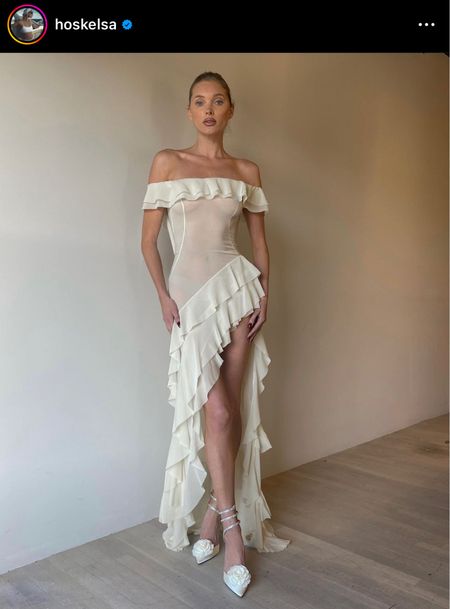 Shop this stunning dress worn by Elsa Hosk! The ruffles and asymmetrical hem are gorgeous details! #TheBanannieDiaries 

#LTKstyletip #LTKGiftGuide #LTKparties