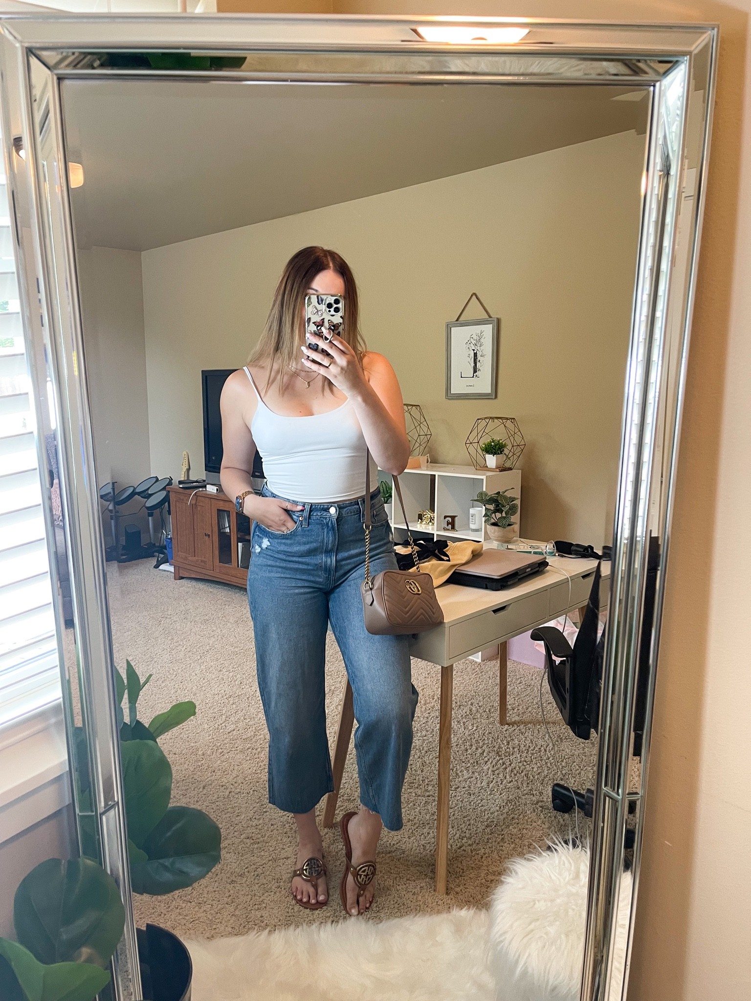Wide leg jean outfit idea! Featuring skims tank lookalike from Amazon

I’m wearing a M tank, size 31 jeans and size 9 sandals 

#LTKunder100 #LTKstyletip #LTKSeasonal